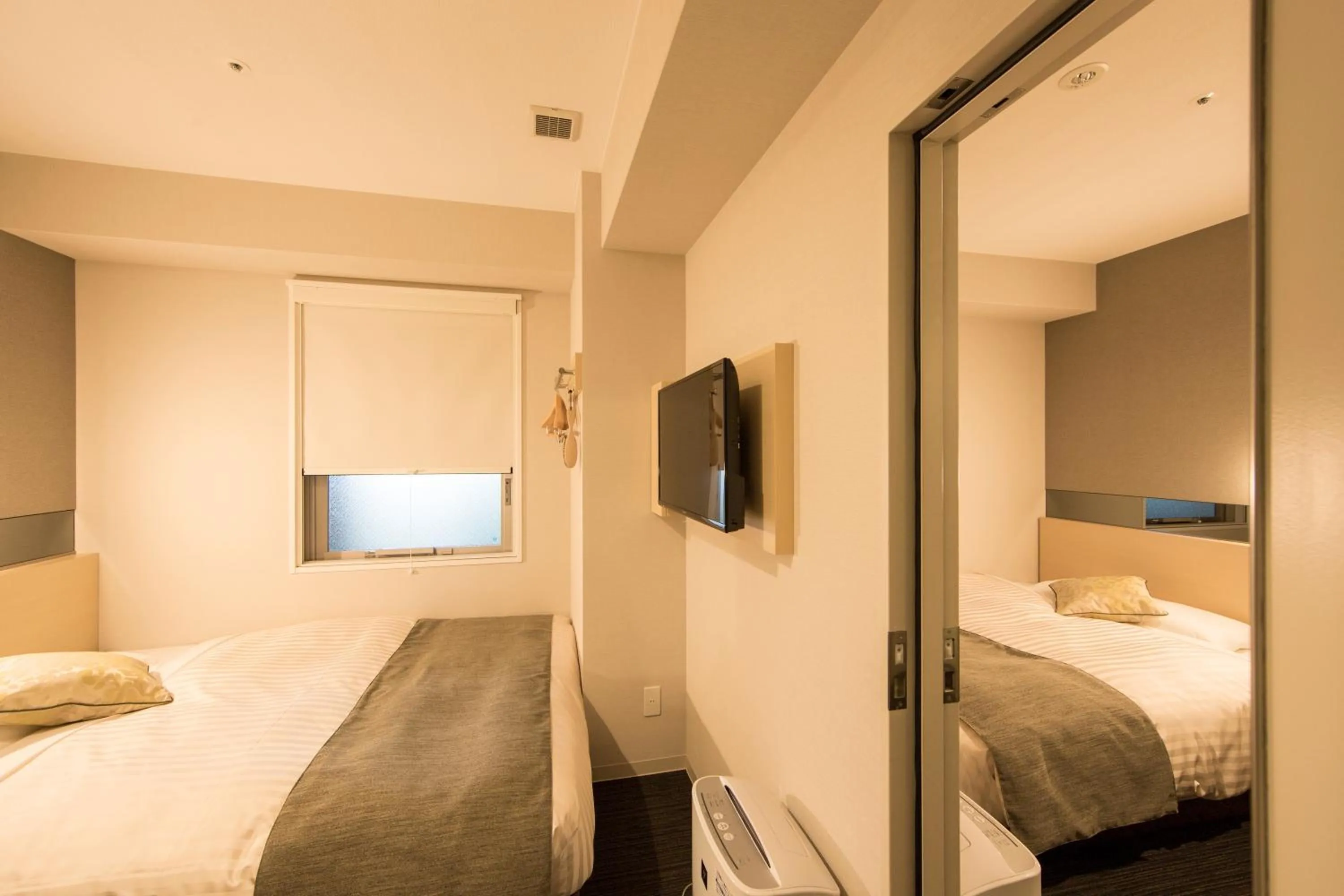 Bed in Super Hotel Premier Osaka Honmachi Ekimae Natural Hot Springs