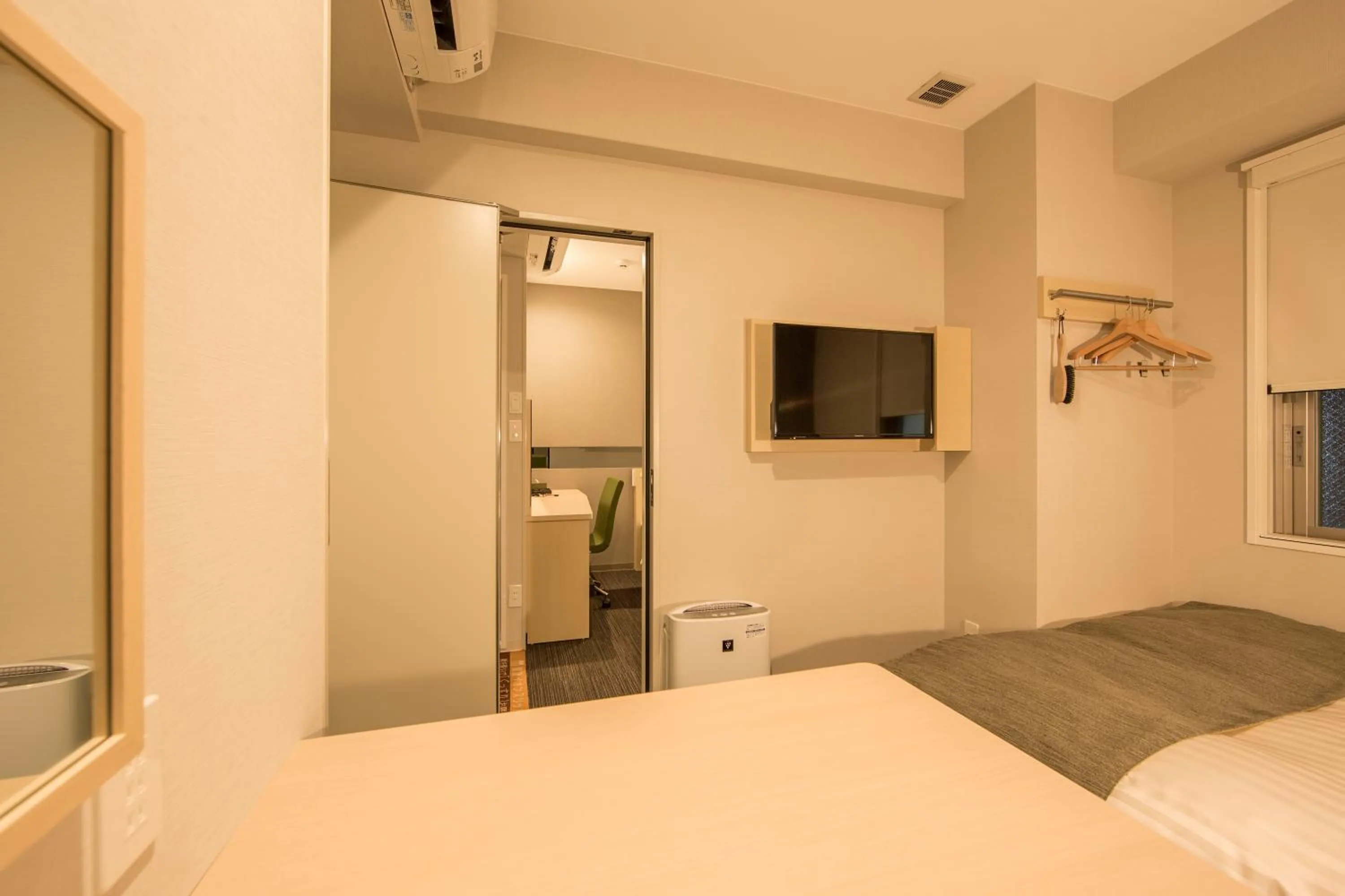 Bed in Super Hotel Premier Osaka Honmachi Ekimae Natural Hot Springs