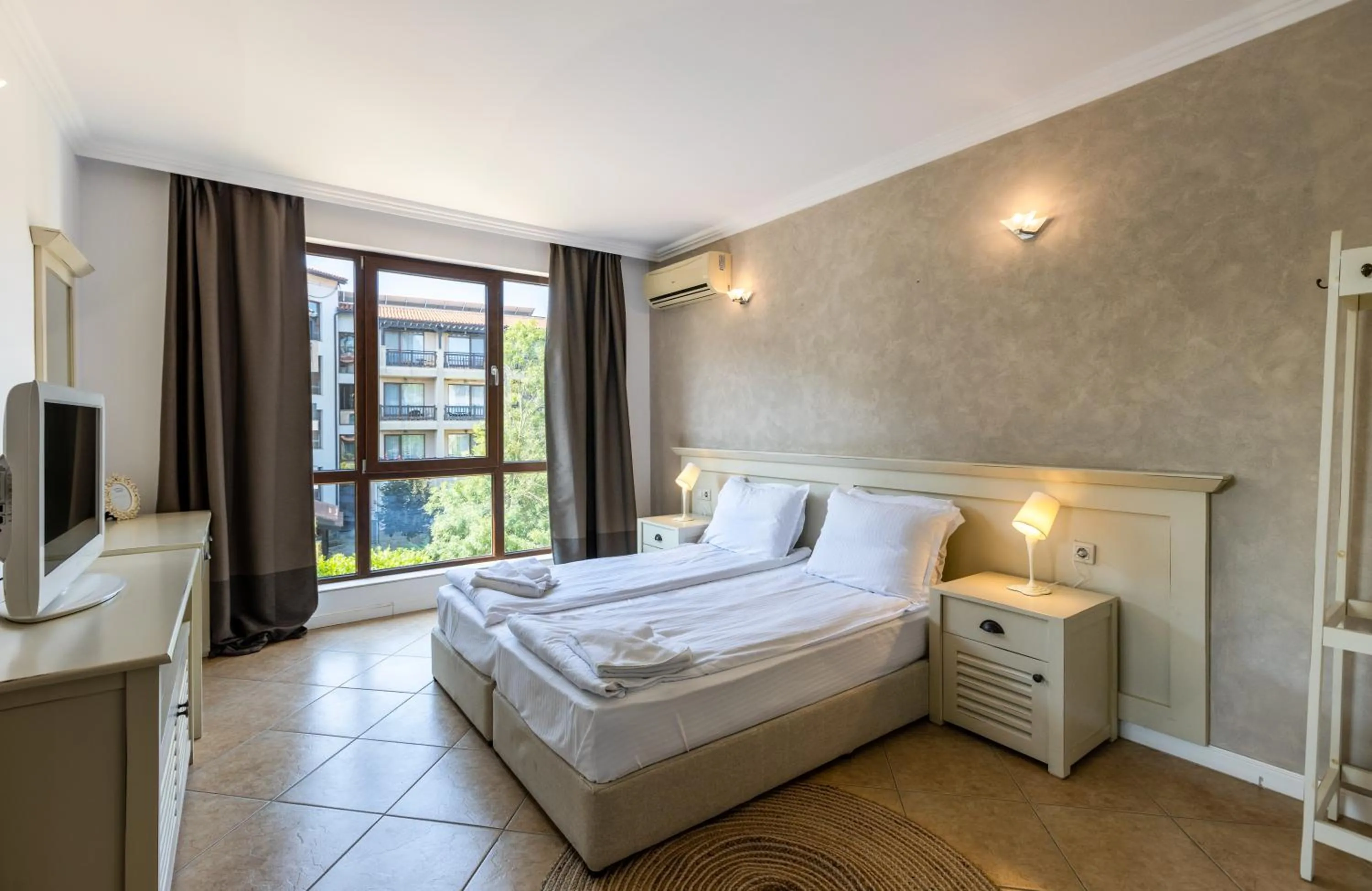 Bed in Oasis Beach Club