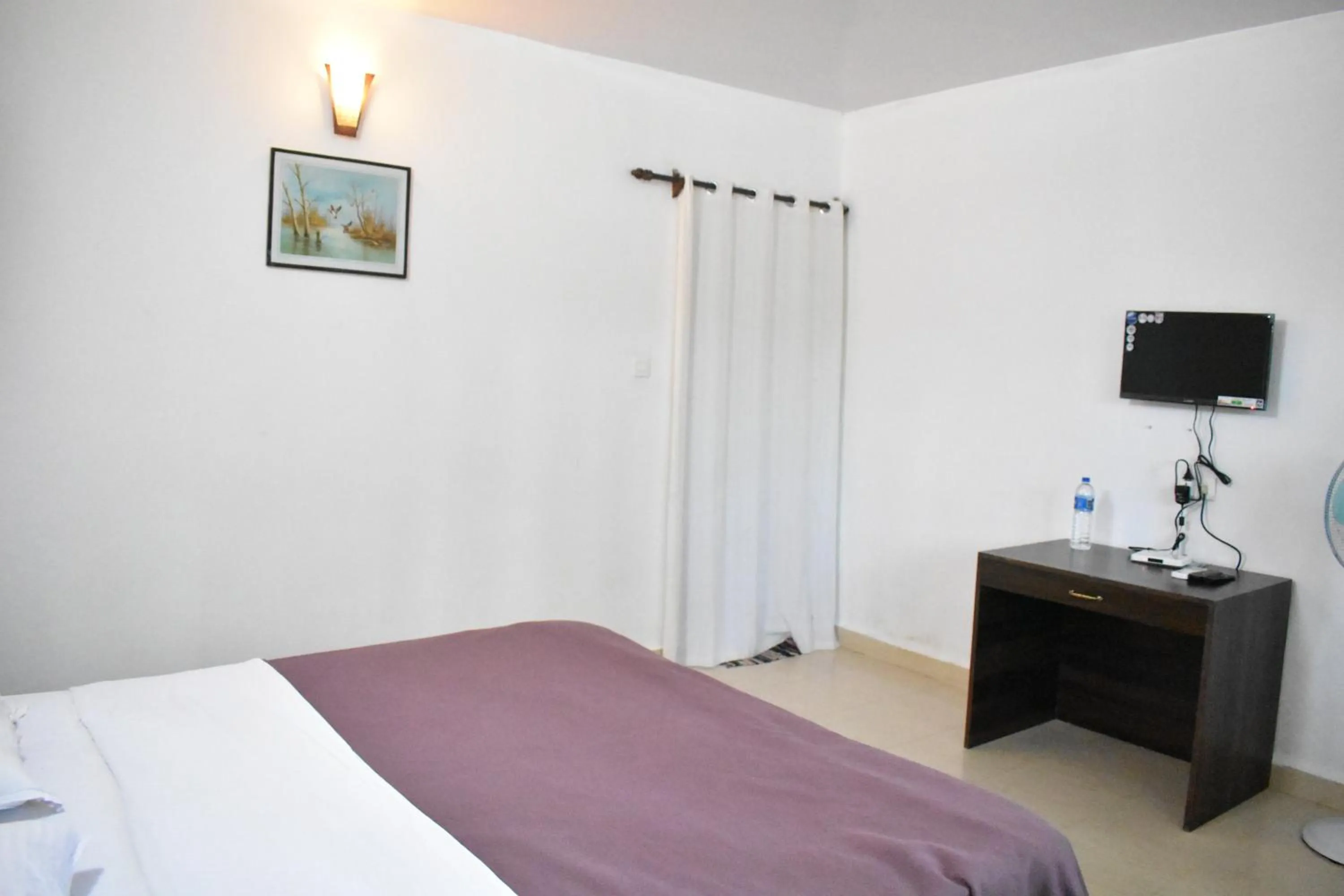 Bed in Club Palolem Resort