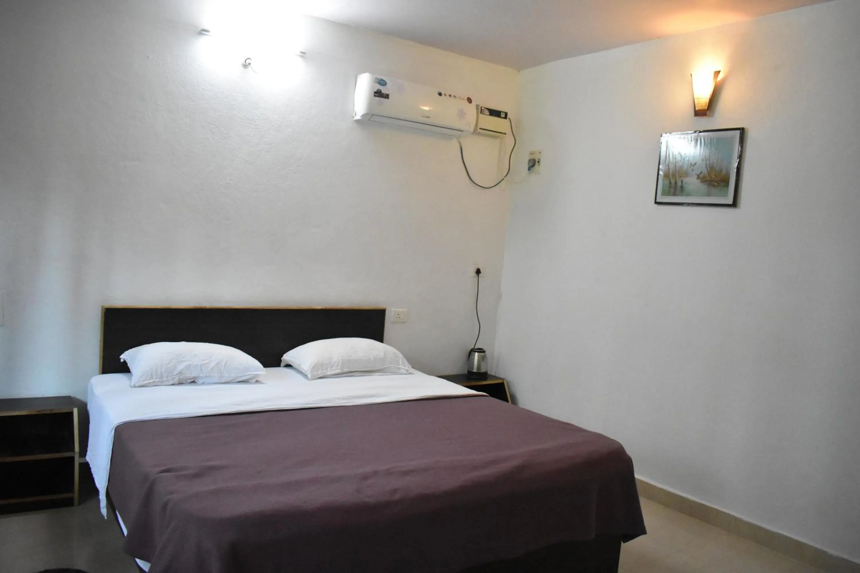 Bed in Club Palolem Resort