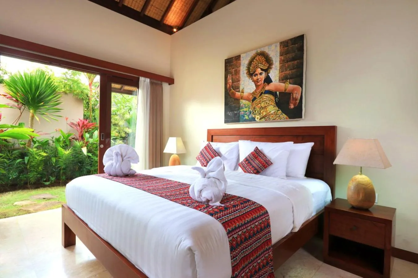 Bed in Desa Di Bali Villas