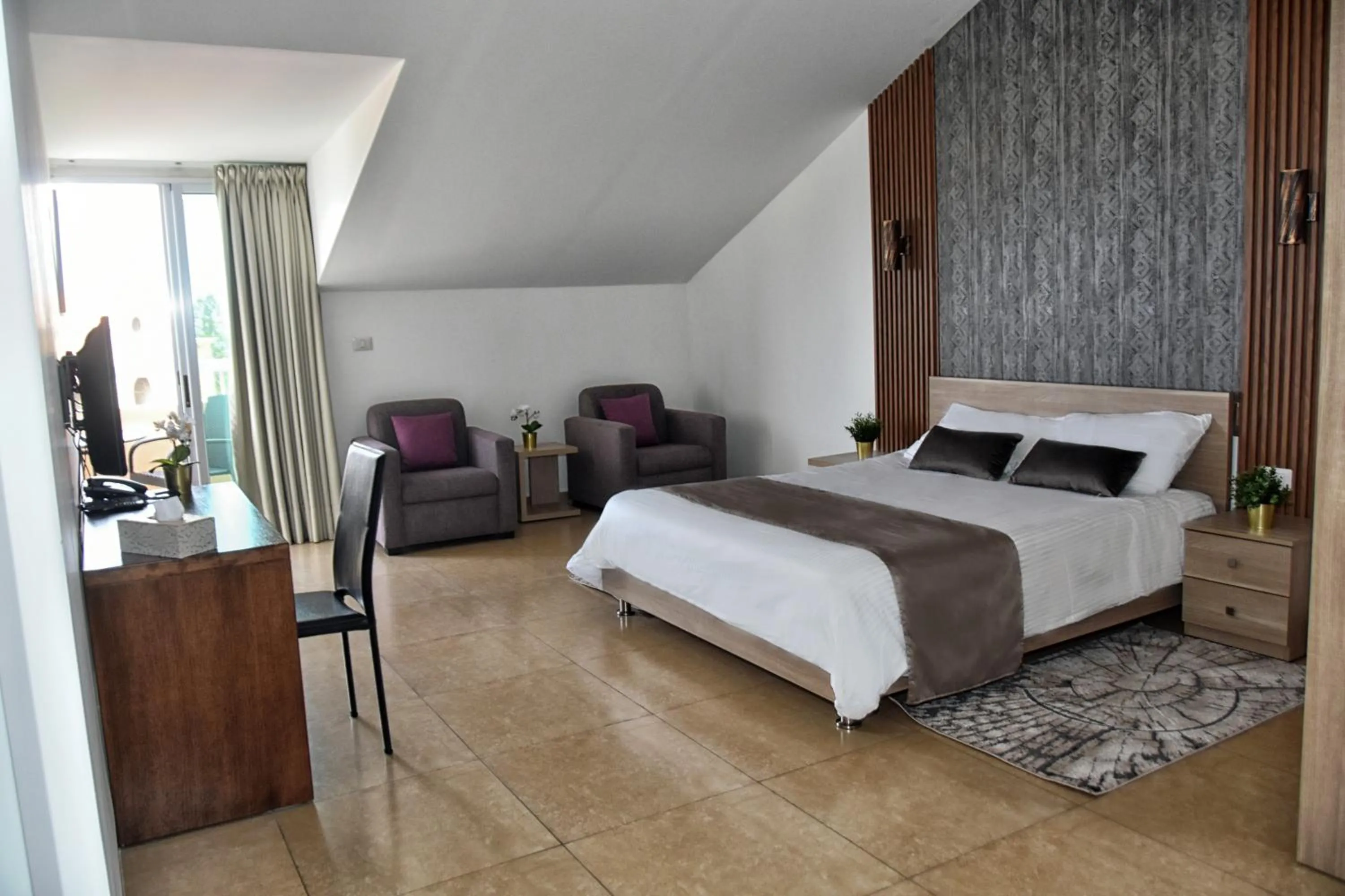 Bed in Byblostar Hotel