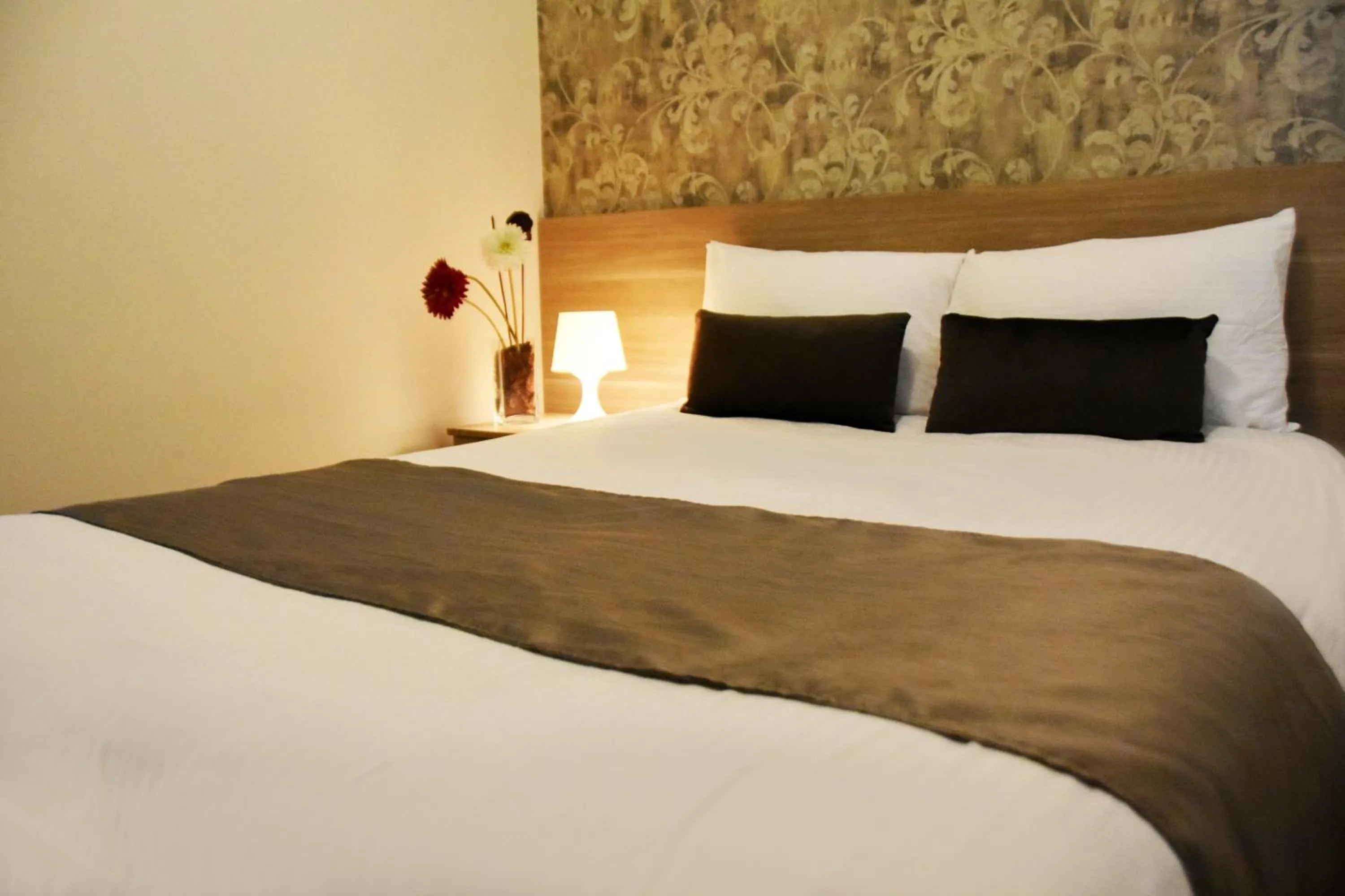 Bed in Byblostar Hotel