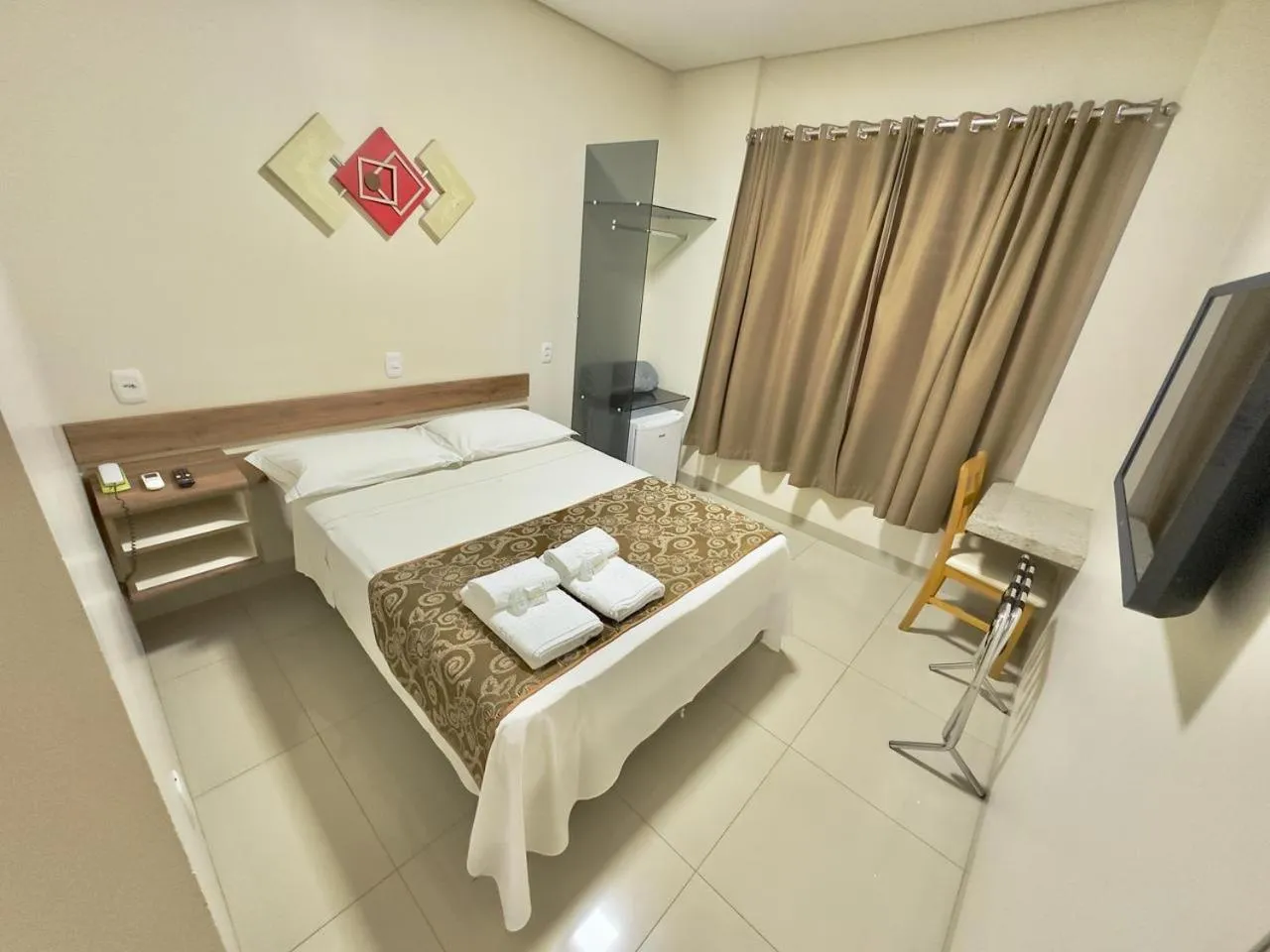 Bed in Hotel Pousada Real