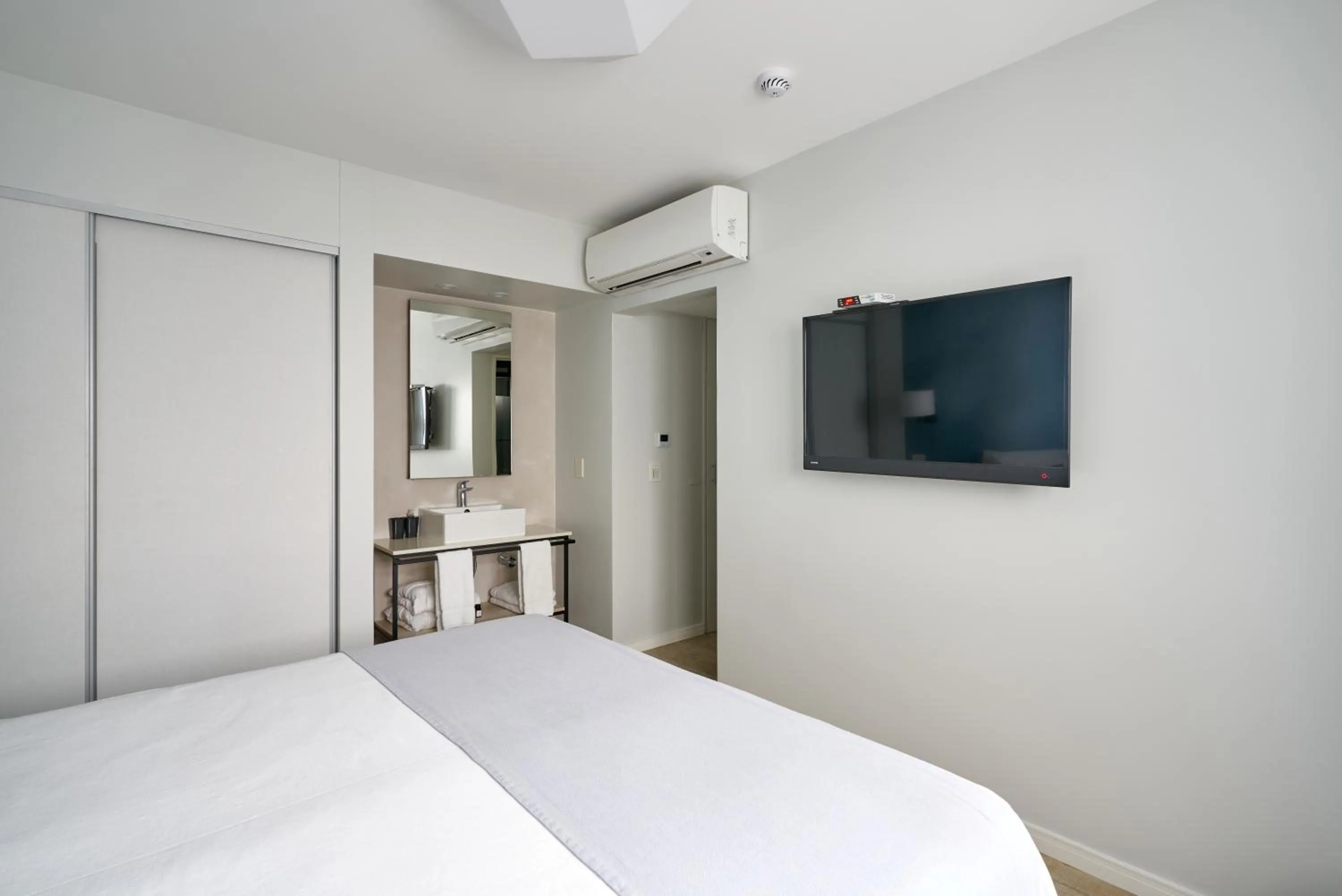 Bed in Almarena Apart & Hotel Boutique