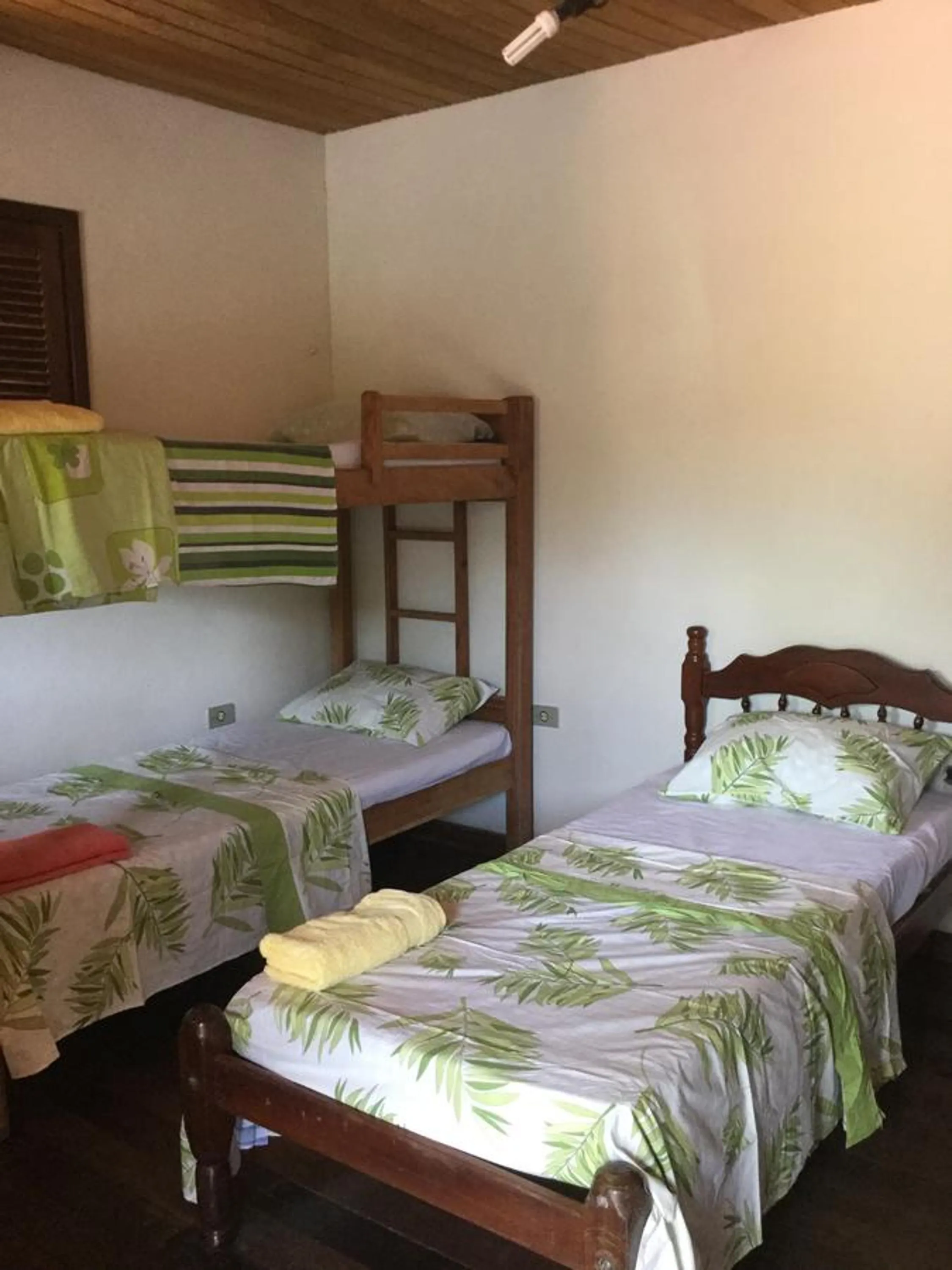 Photo of the whole room, Bed in Pousada Alquimia