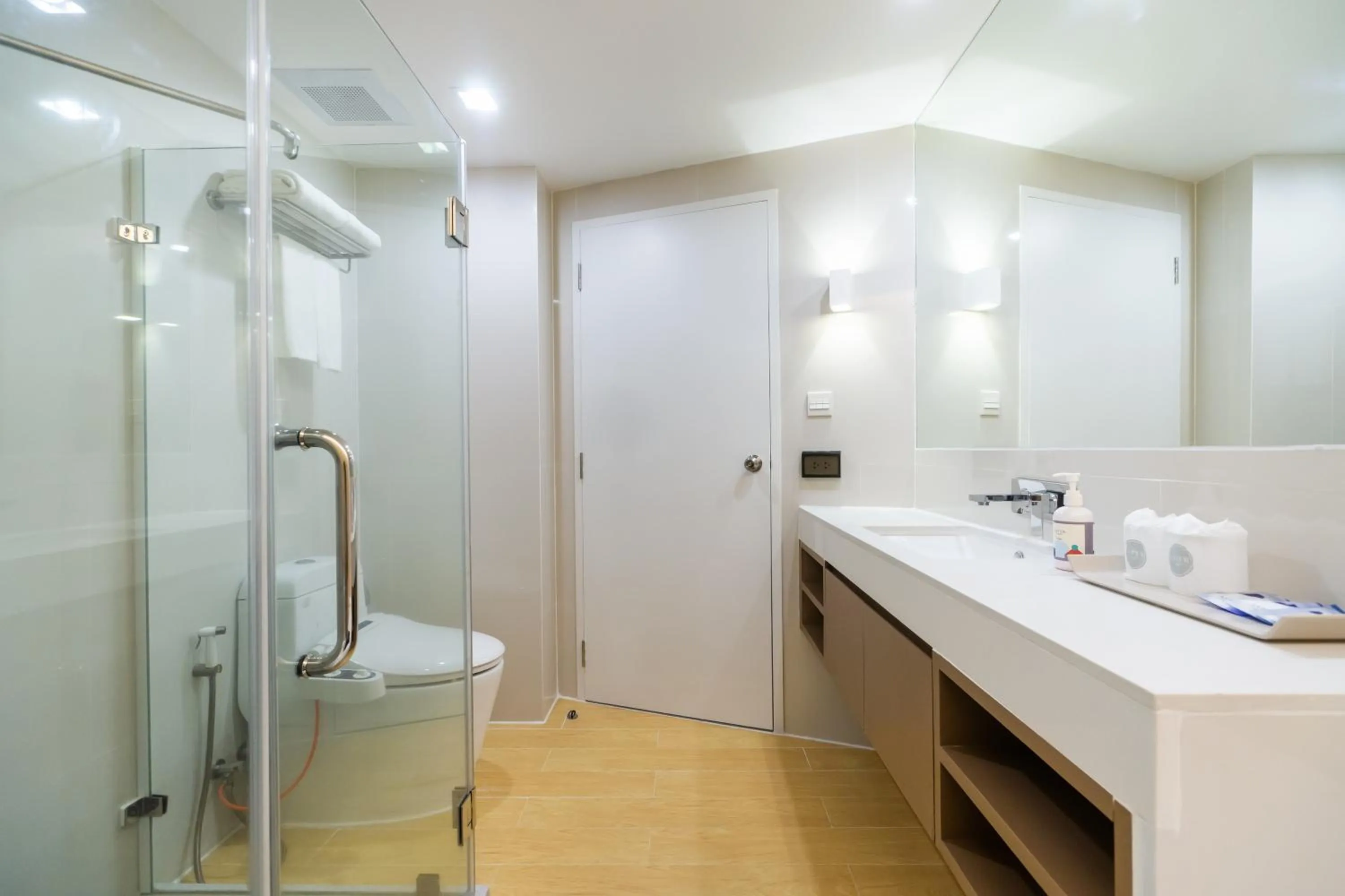 Shower in Aster Hotel and Residence by At Mind