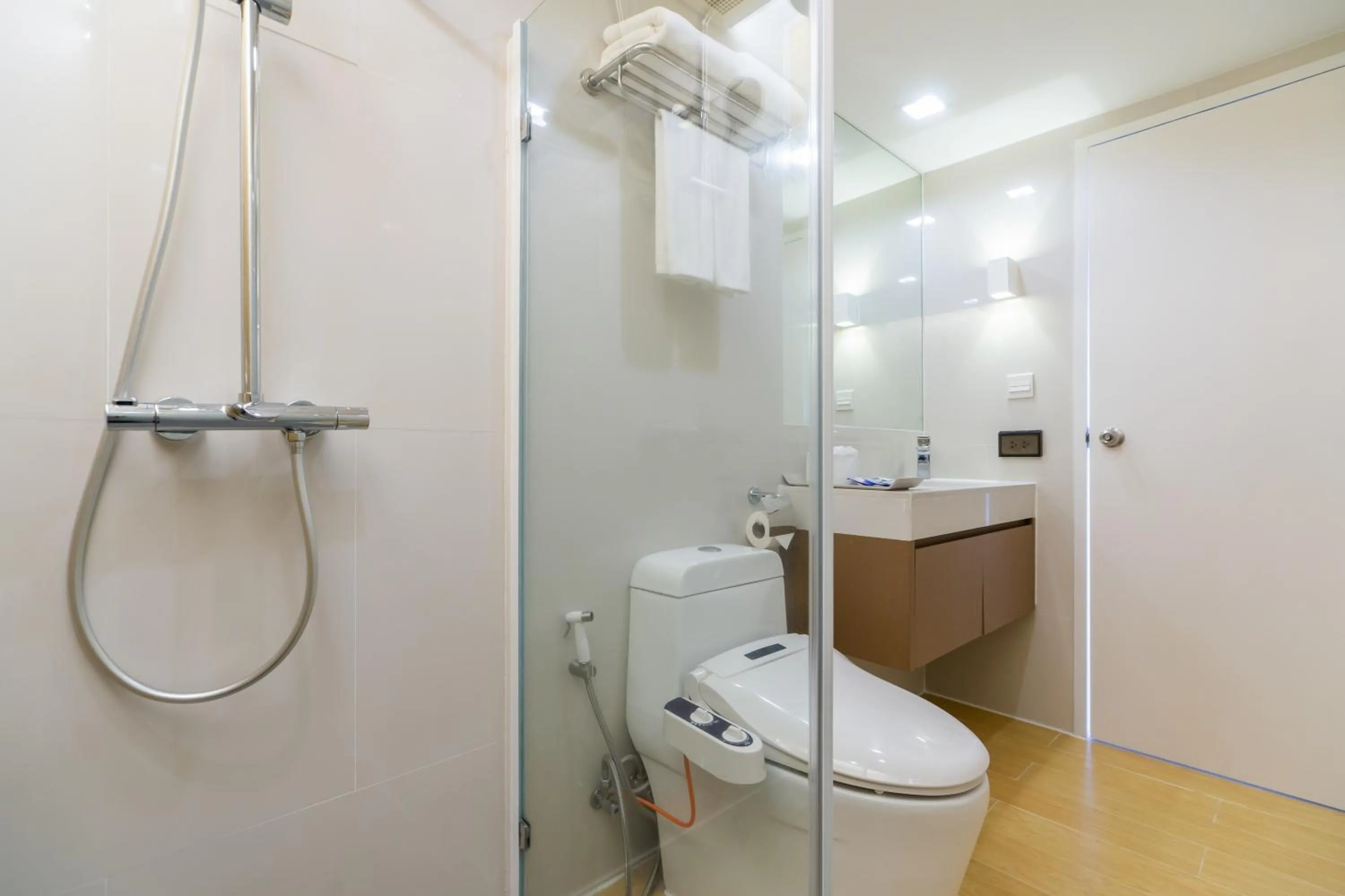 Shower in Aster Hotel and Residence by At Mind