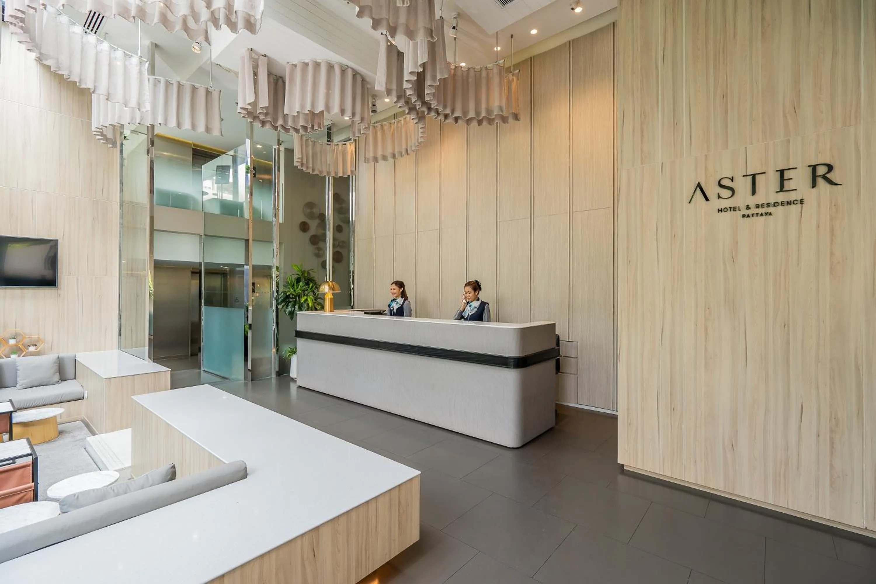 Lobby or reception in Aster Hotel and Residence by At Mind