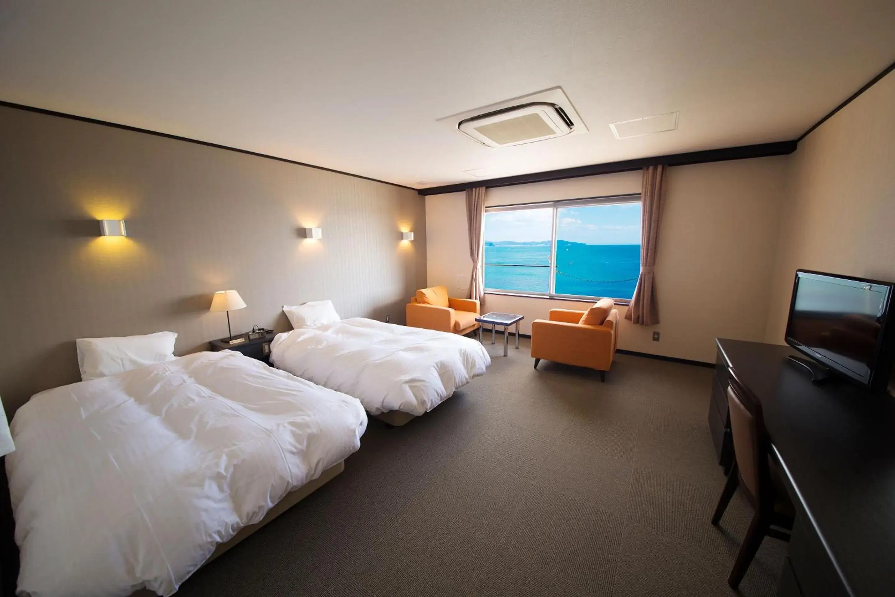 Photo of the whole room, Bed in Seaside Hotel Taimaru Kaigetsu Photo of the whole room, Bed in Seaside Hotel Taimaru Kaigetsu