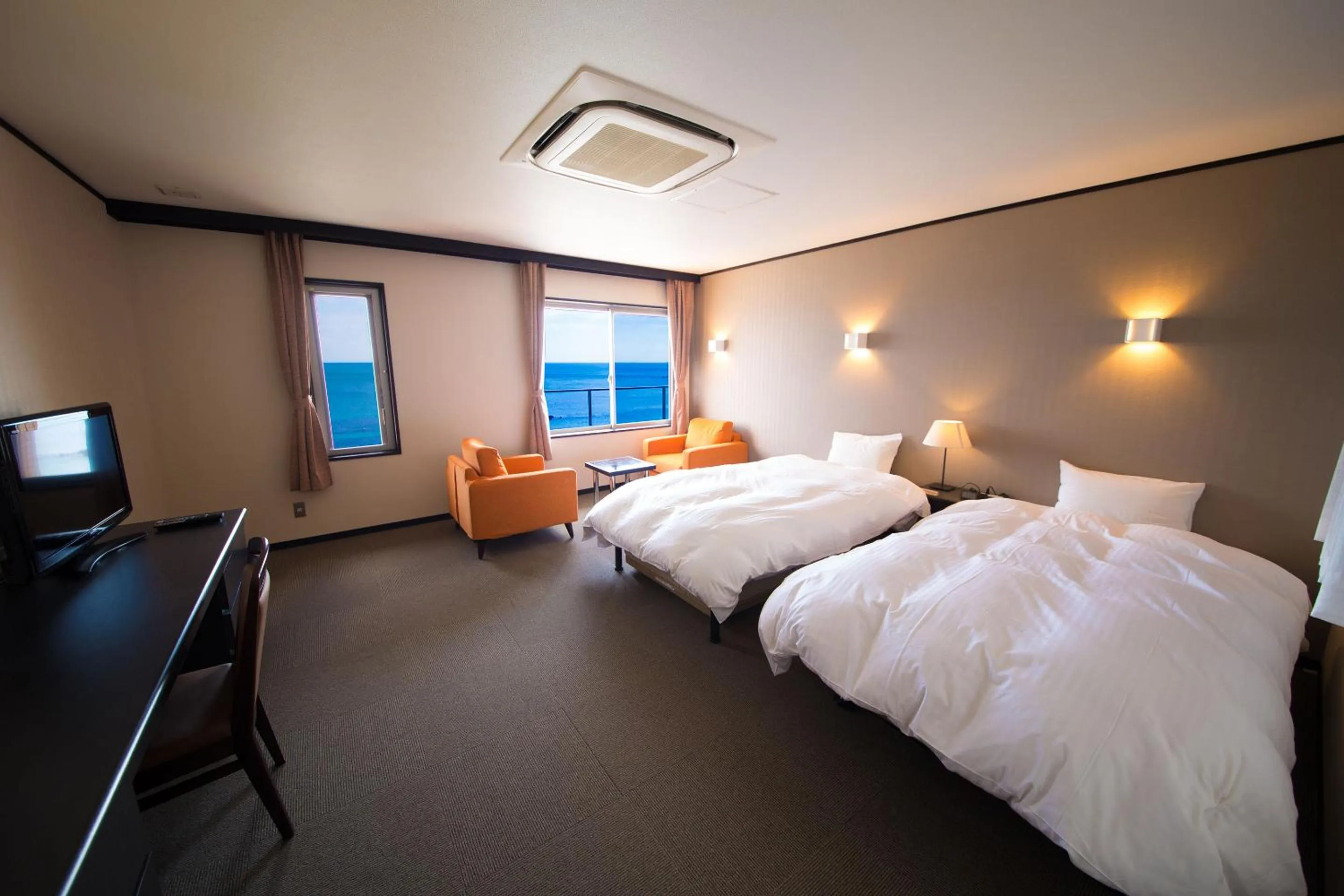 Photo of the whole room, Bed in Seaside Hotel Taimaru Kaigetsu