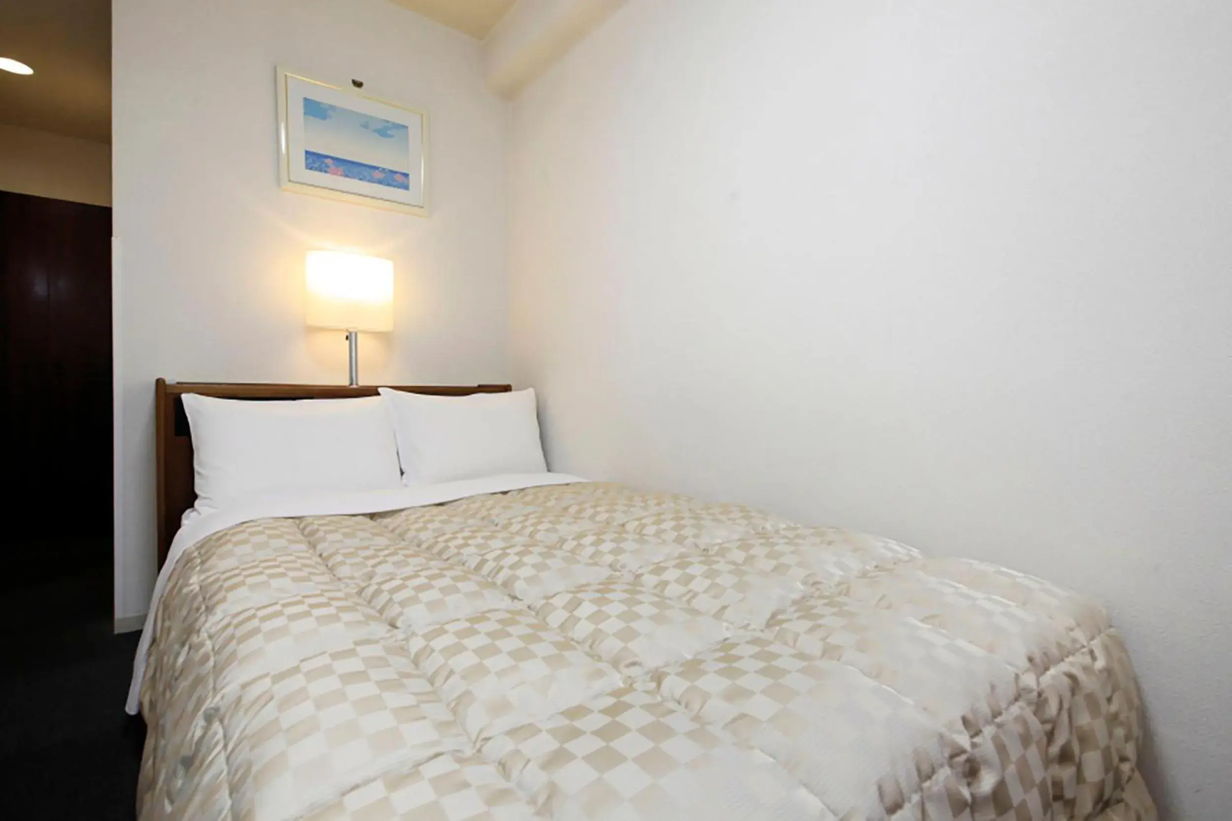 Bed in Shinjuku Urban Hotel Bed in Shinjuku Urban Hotel