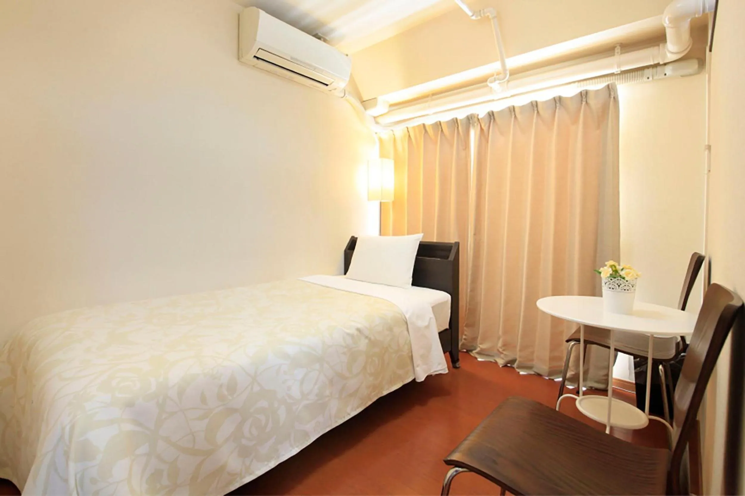 Bed in Shinjuku Urban Hotel