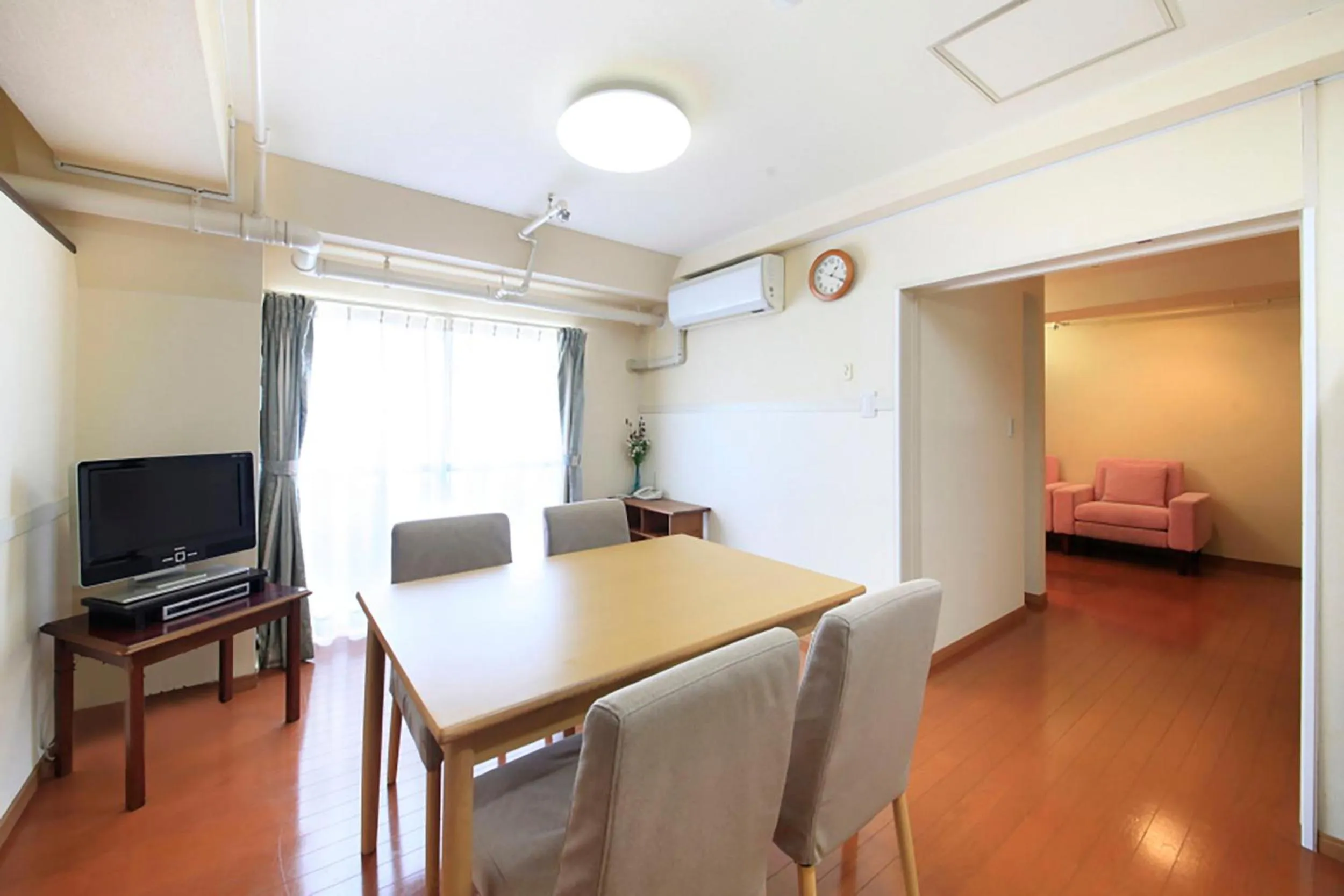 Living room, Bed in Shinjuku Urban Hotel
