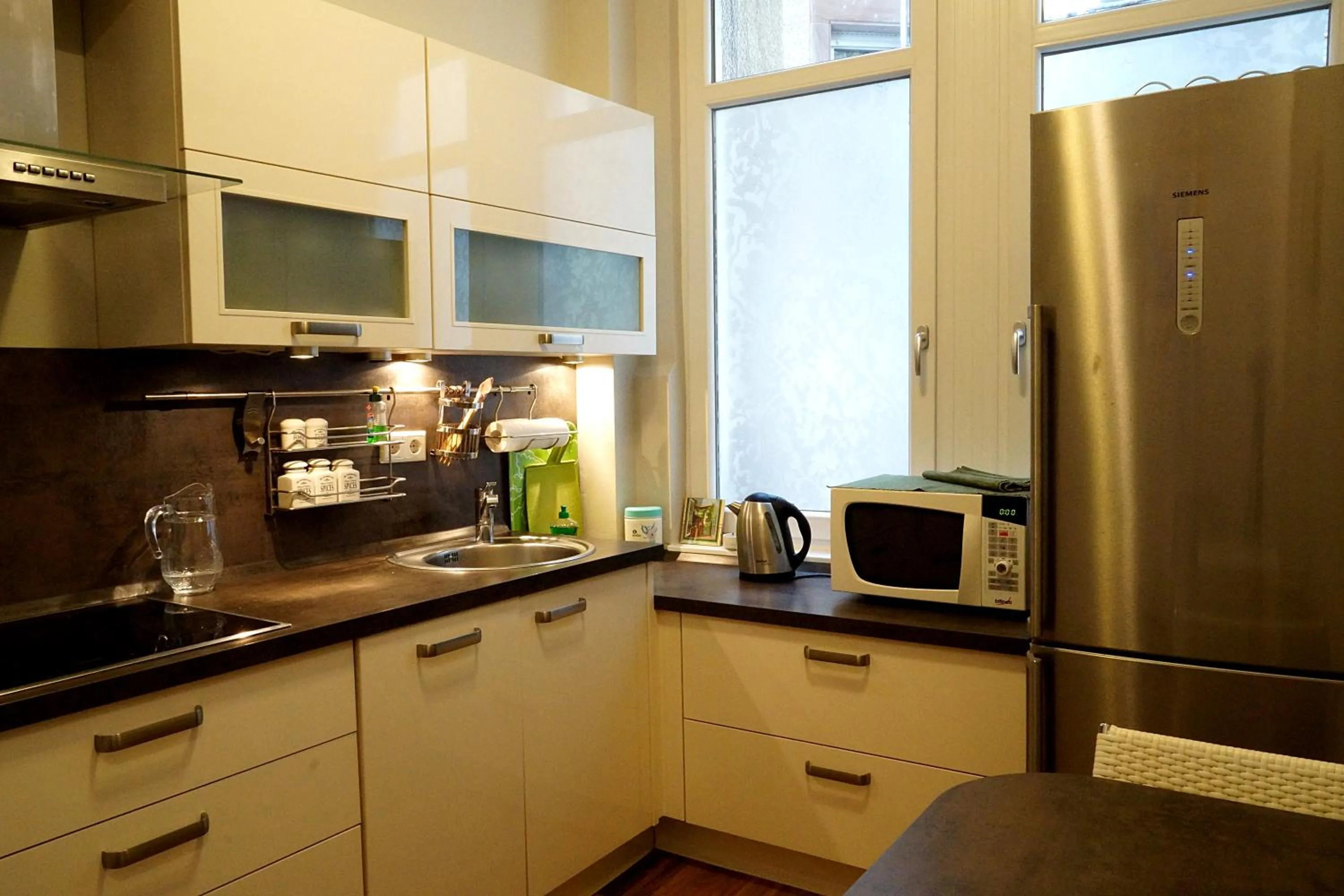 Kitchen or kitchenette in Vip Apartment an den Thermen