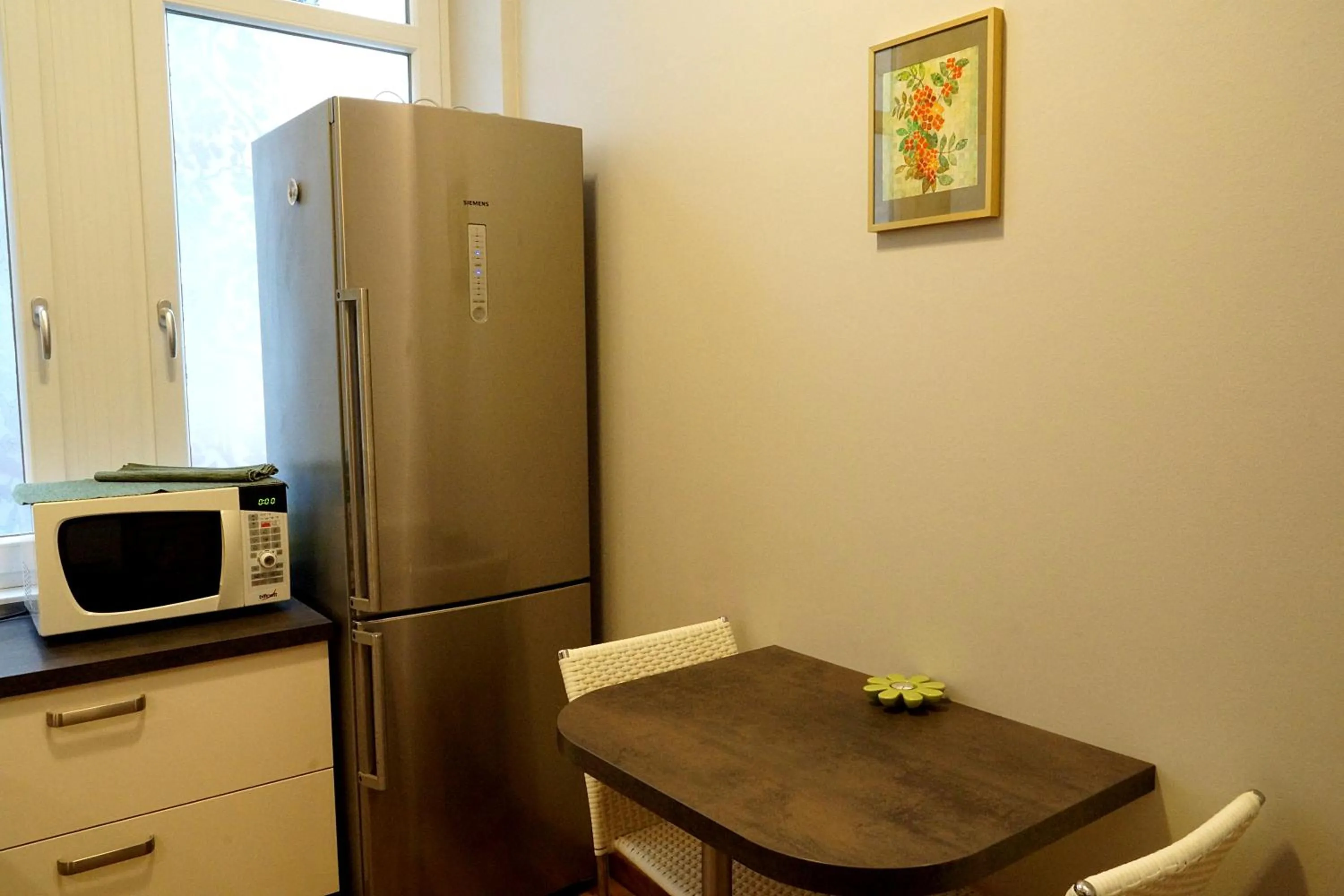 Kitchen or kitchenette in Vip Apartment an den Thermen