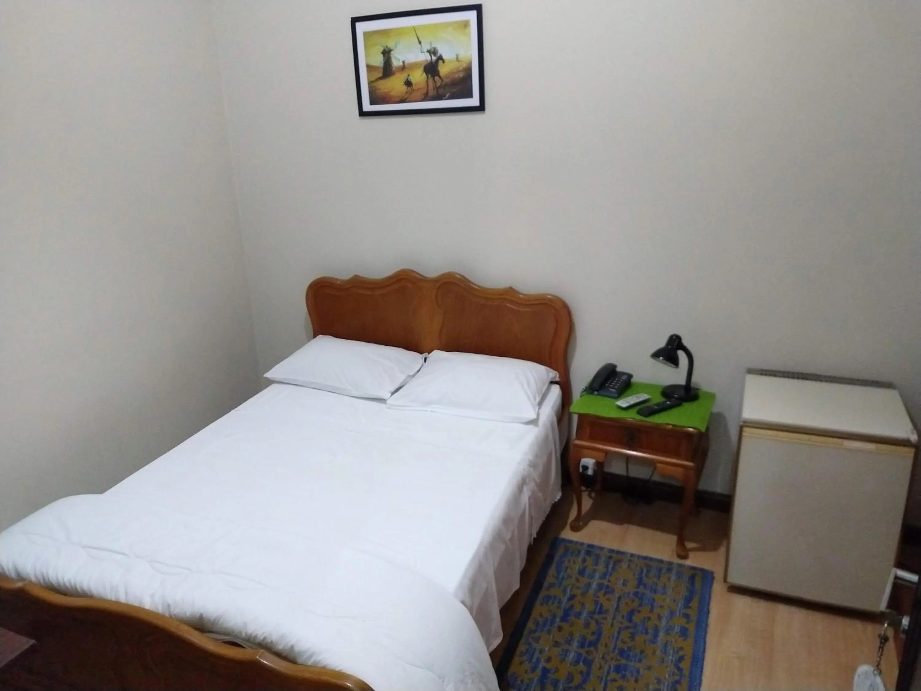 Bed in Hotel Cervantes