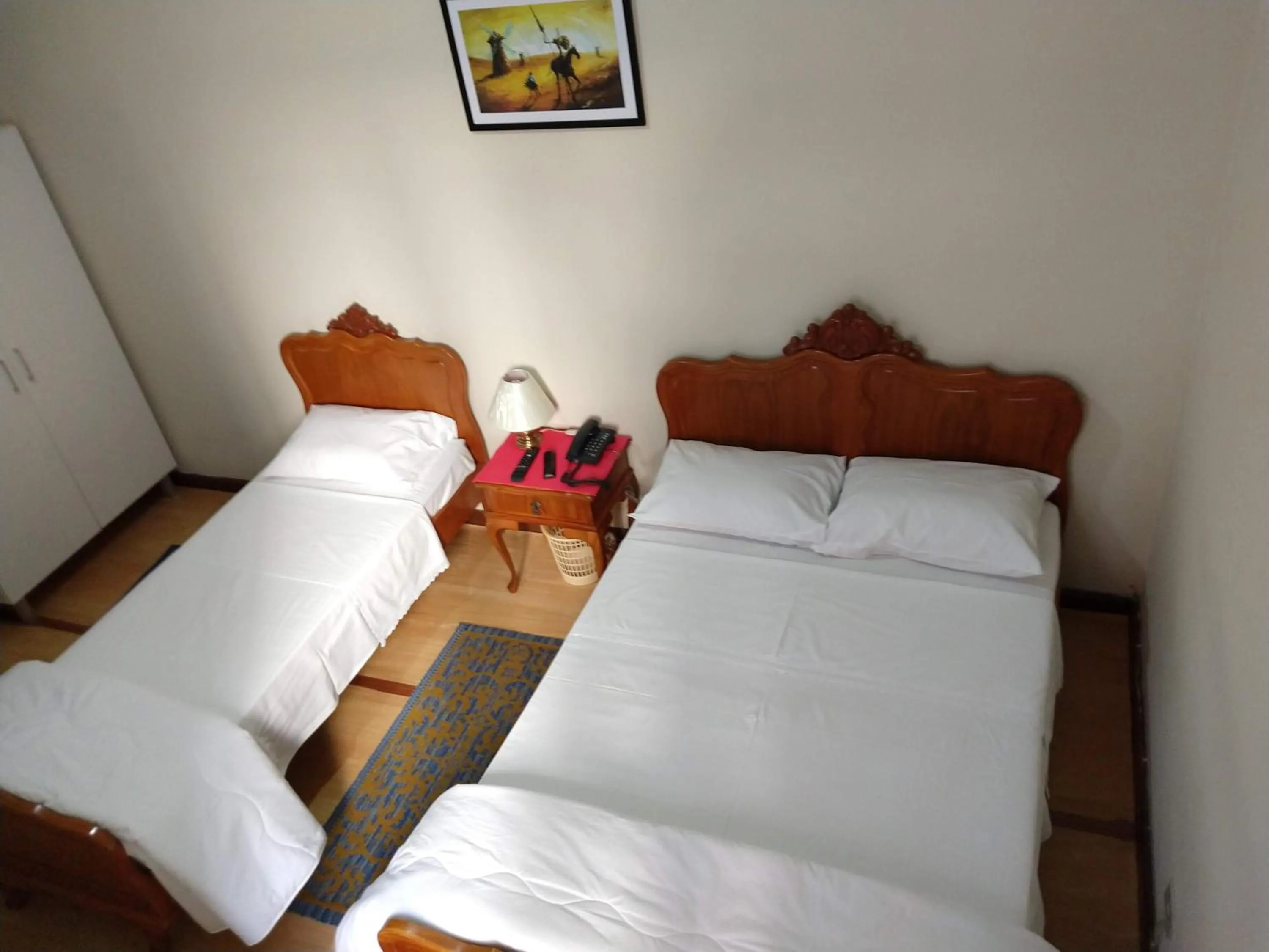 Bed in Hotel Cervantes