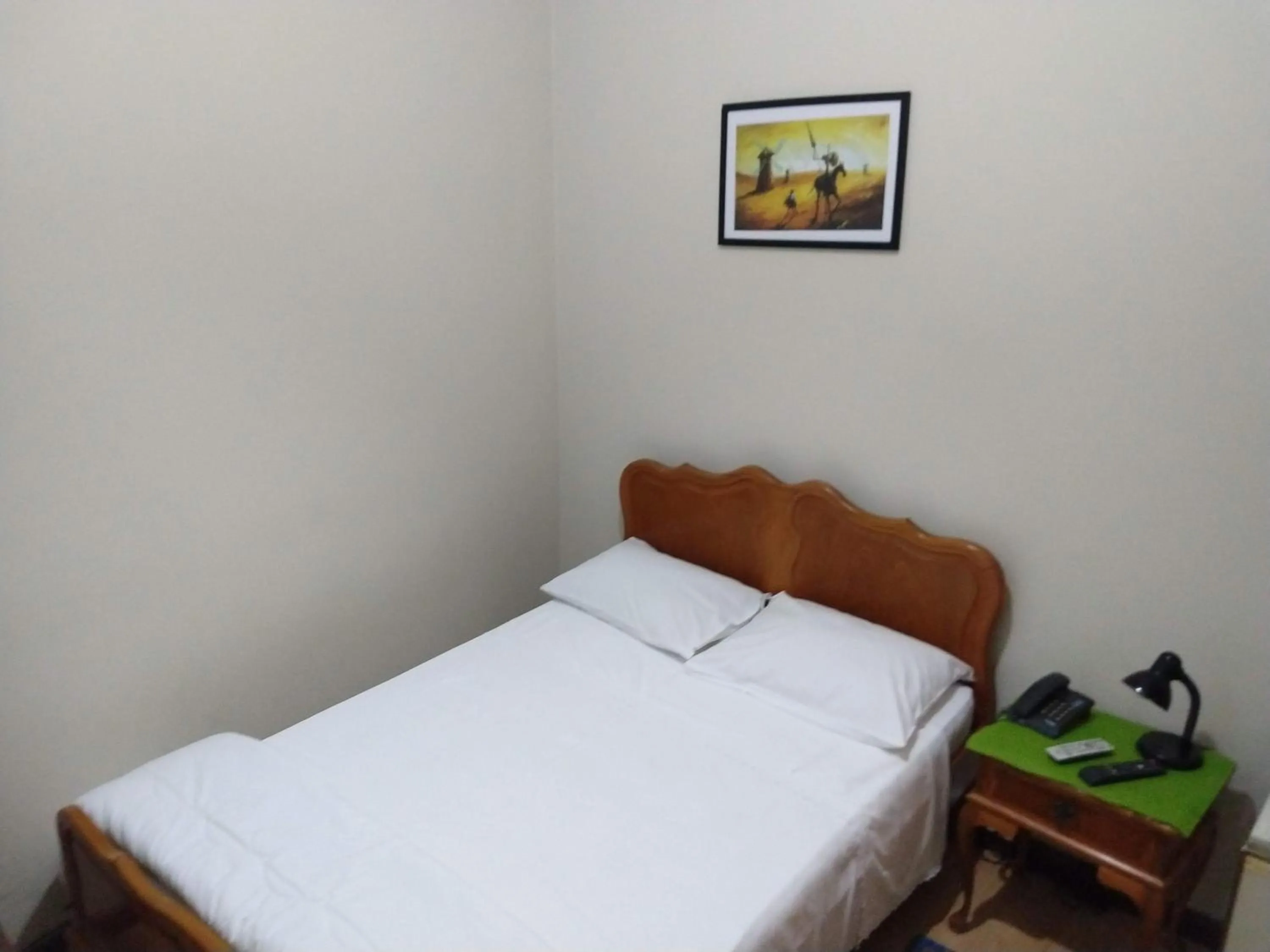 Bed in Hotel Cervantes