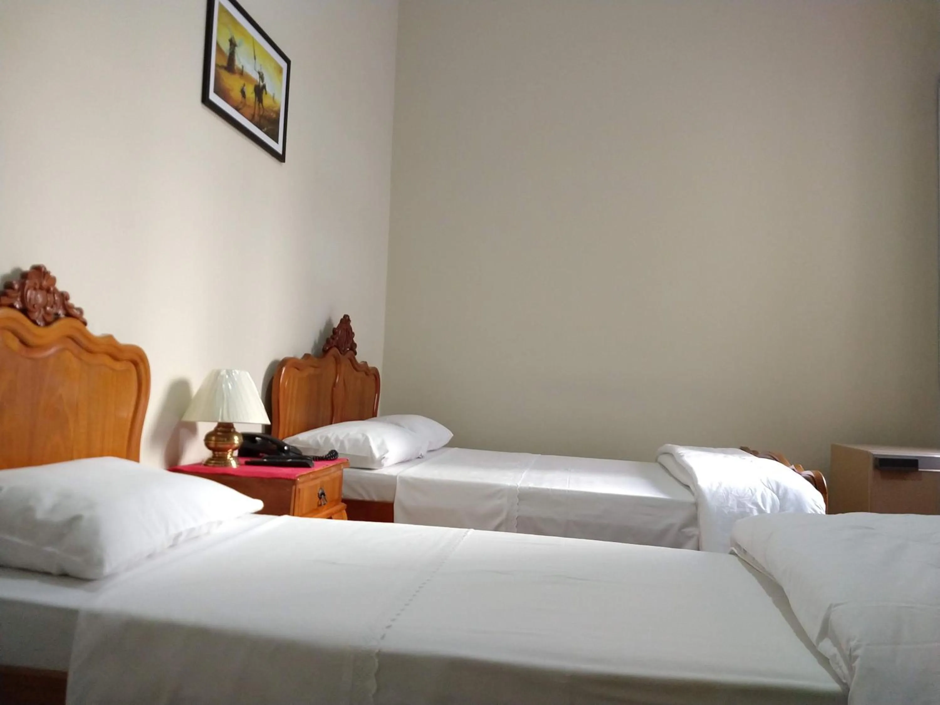 Bed in Hotel Cervantes