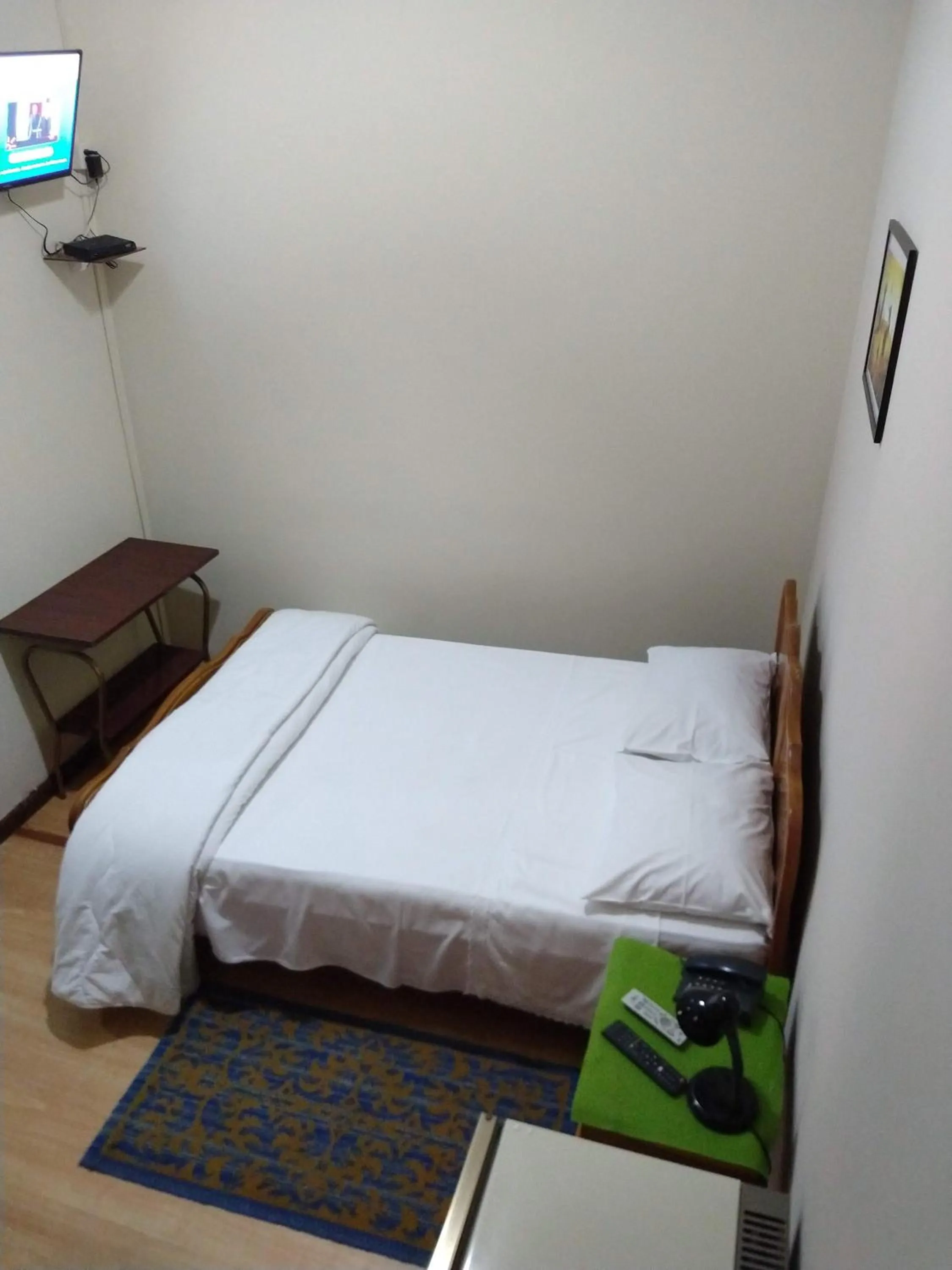 Bed in Hotel Cervantes