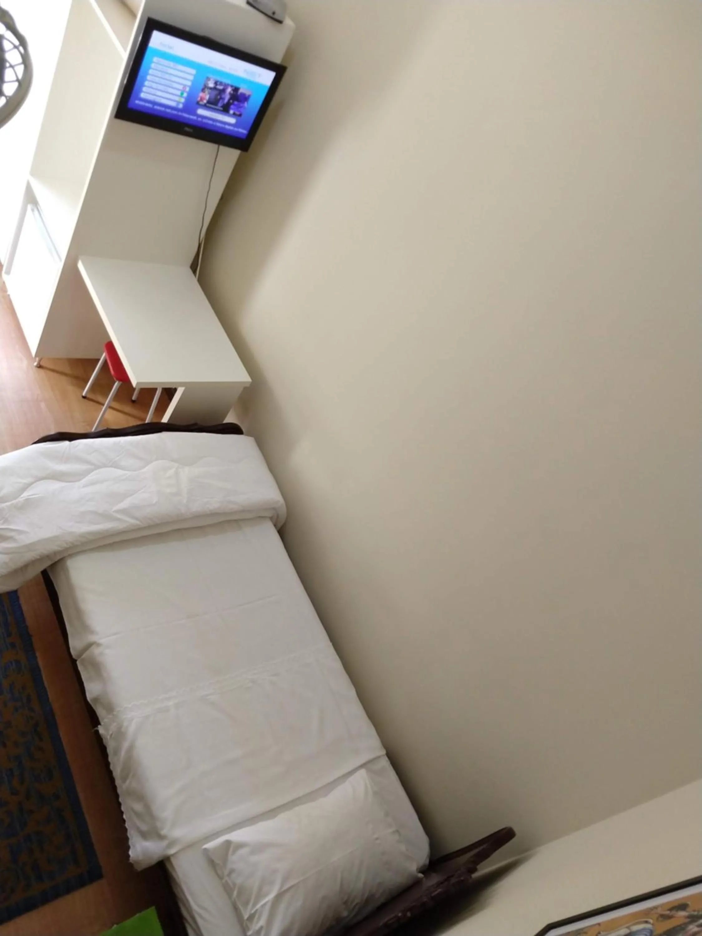 Bed in Hotel Cervantes
