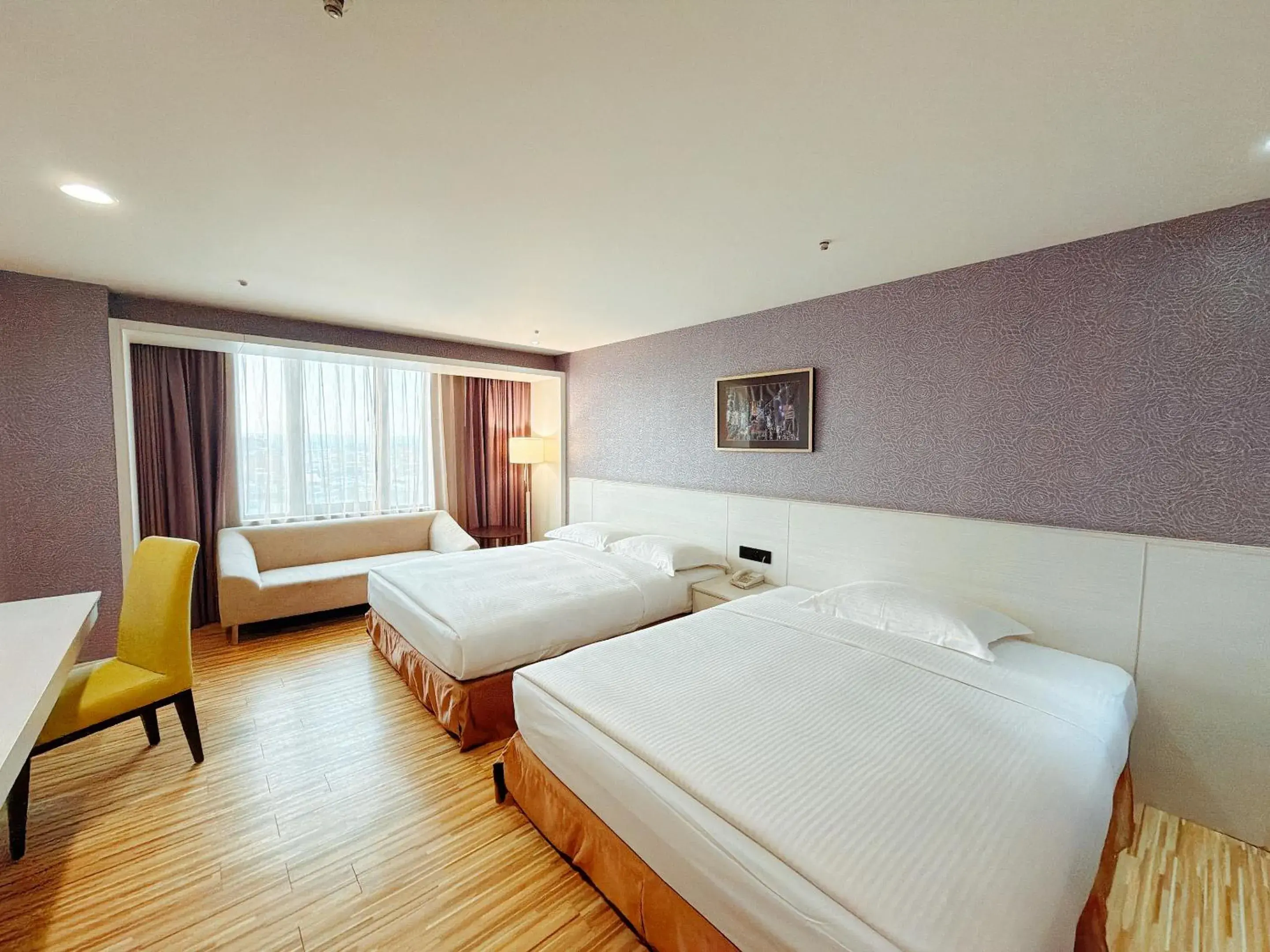 Deluxe Triple Room in Wemeet Hotel Deluxe Triple Room in Wemeet Hotel