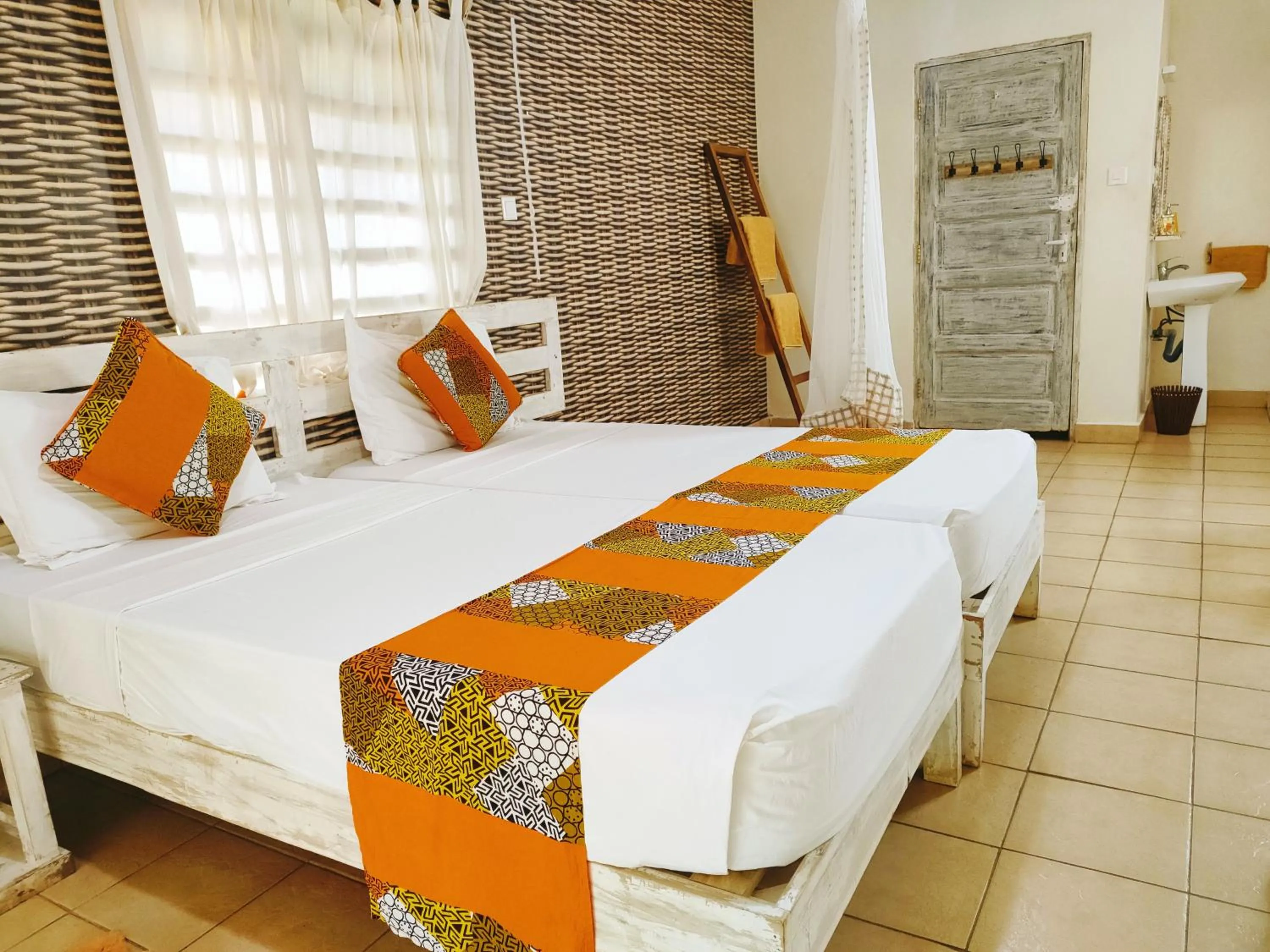Photo of the whole room, Bed in Upani in Diani