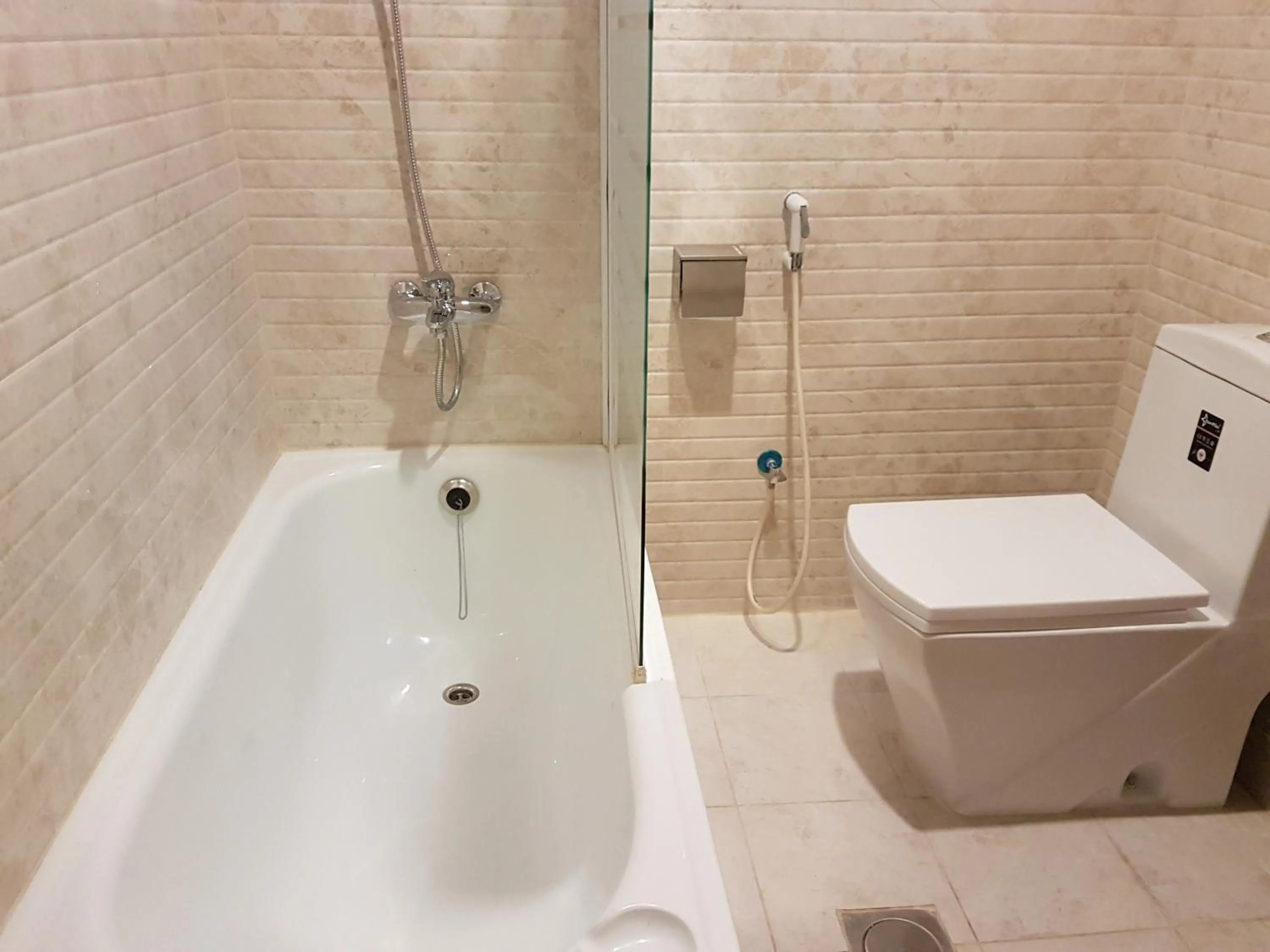 Bathroom in Travellerinn Serviced Apartment