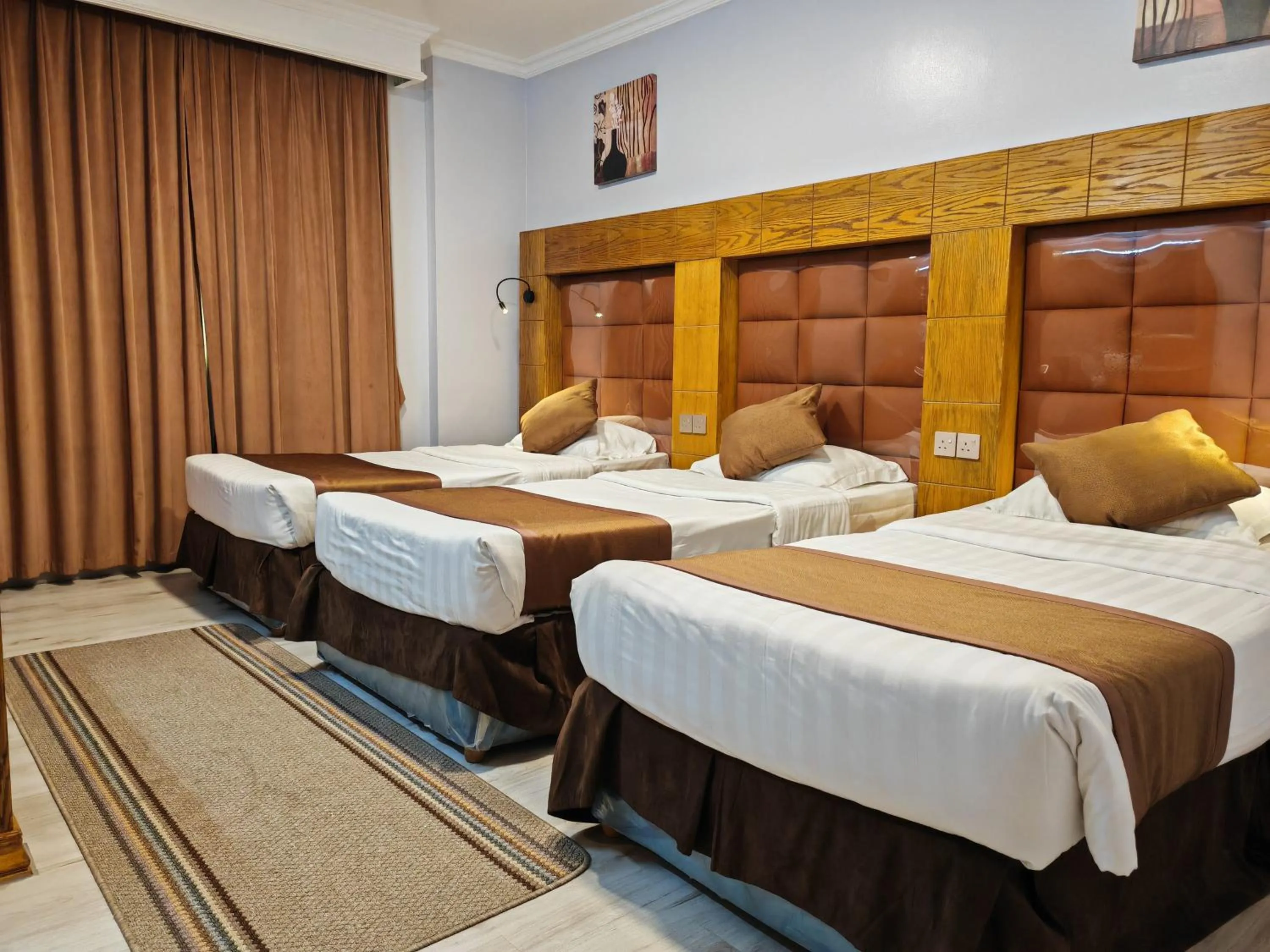 Bedroom, Bed in Travellerinn Serviced Apartment