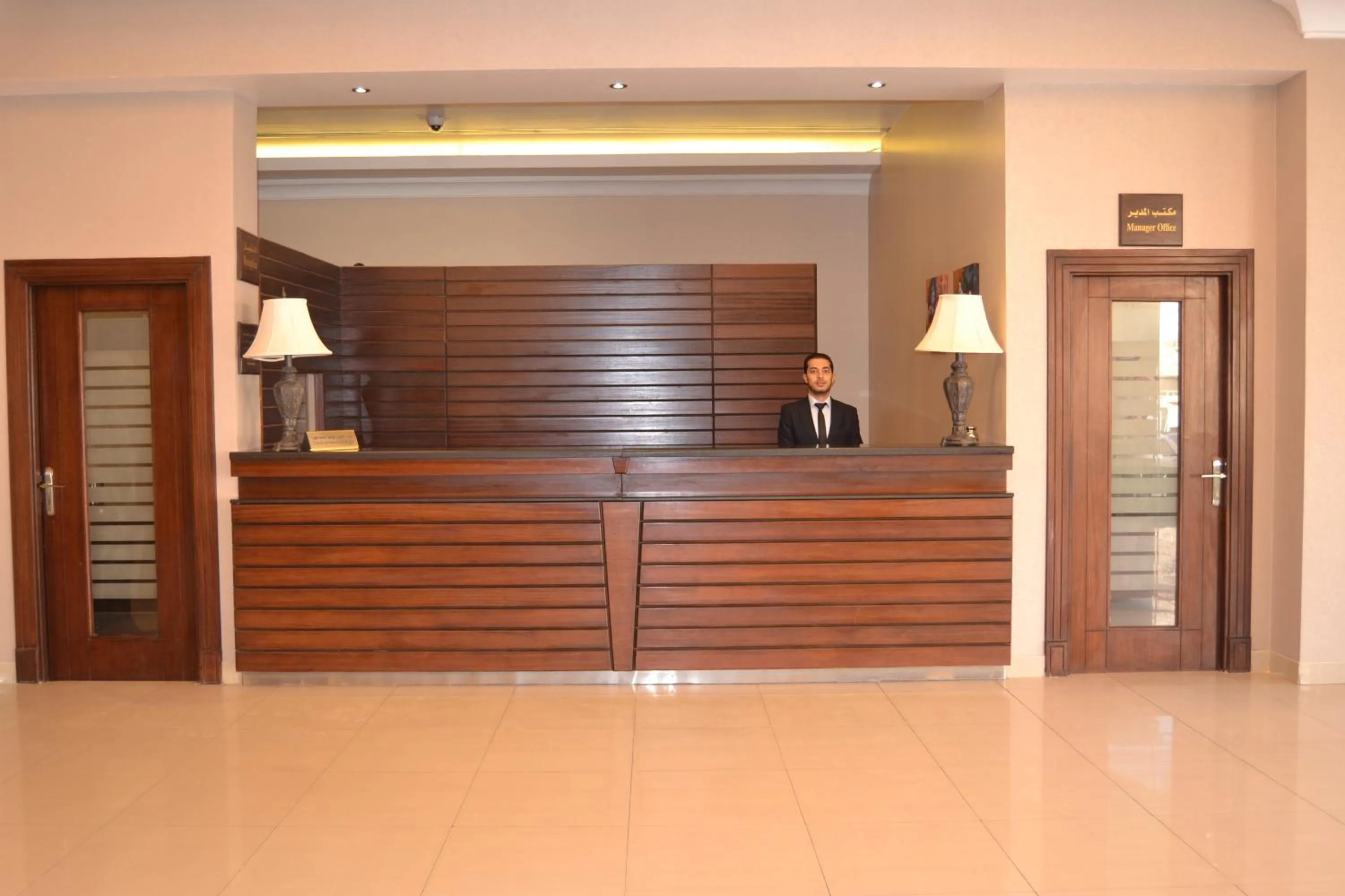 Staff in Travellerinn Serviced Apartment