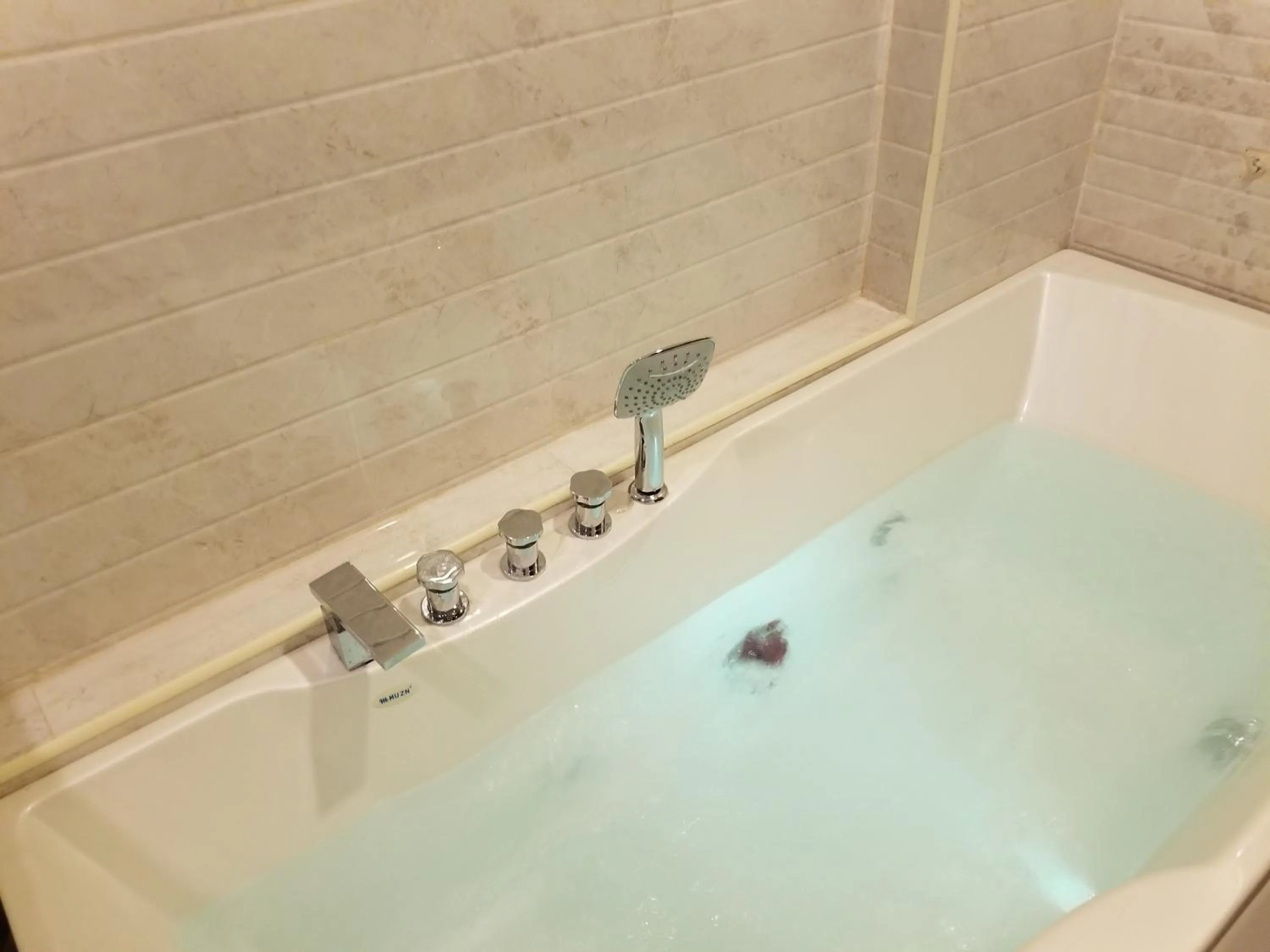 Bathroom in Travellerinn Serviced Apartment