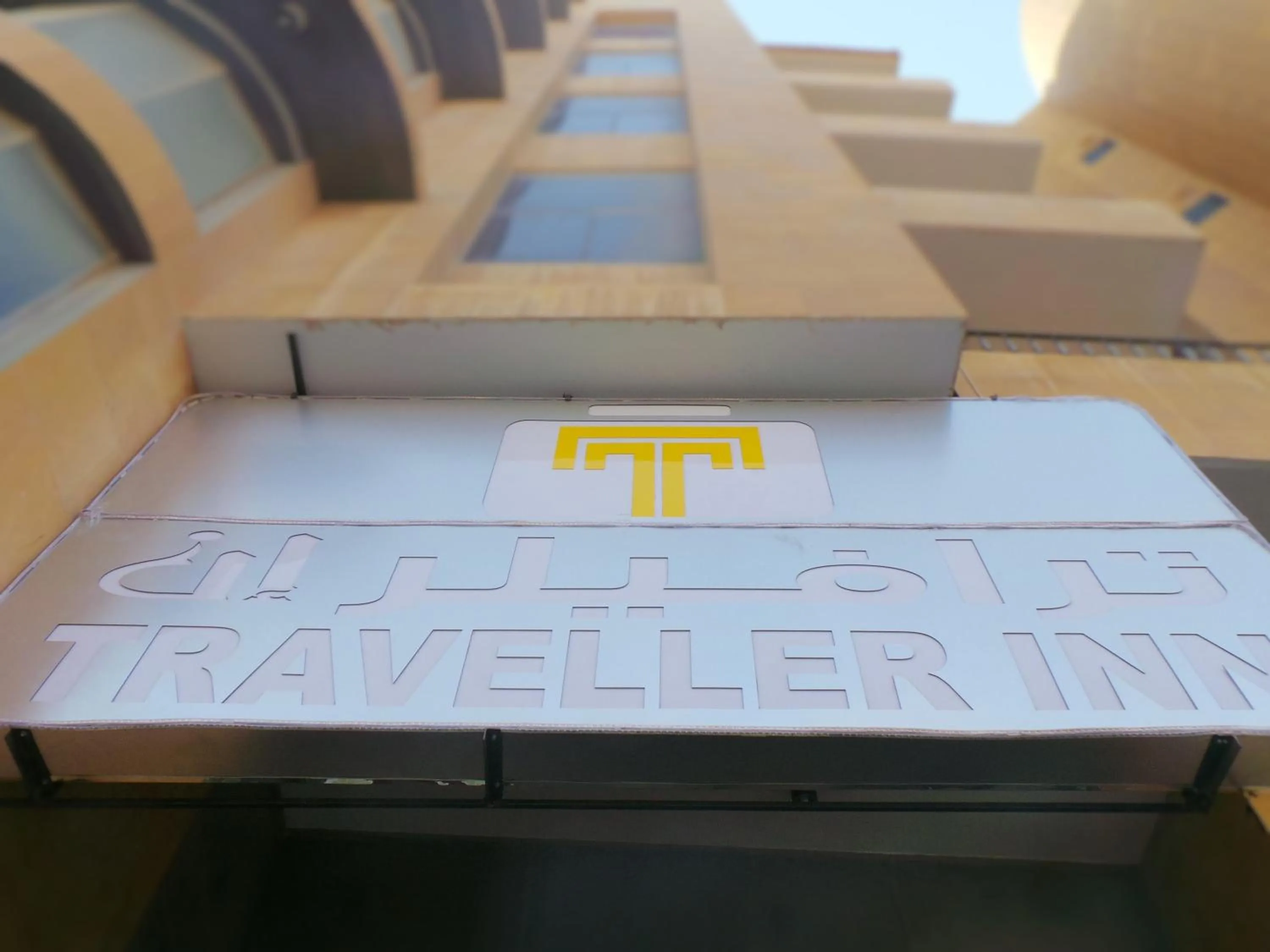 Property logo or sign in Travellerinn Serviced Apartment