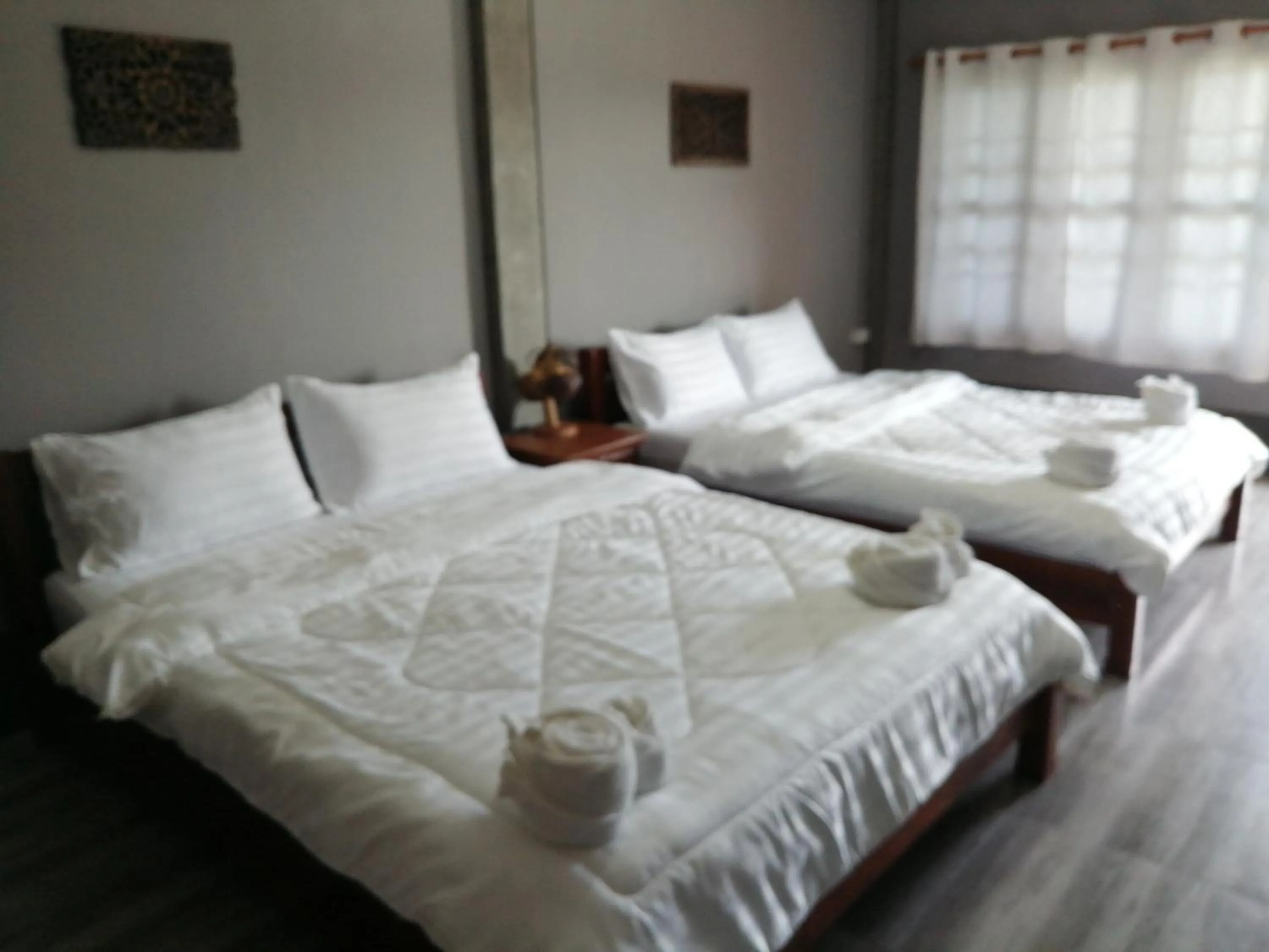 Bed in Yotin Guest House