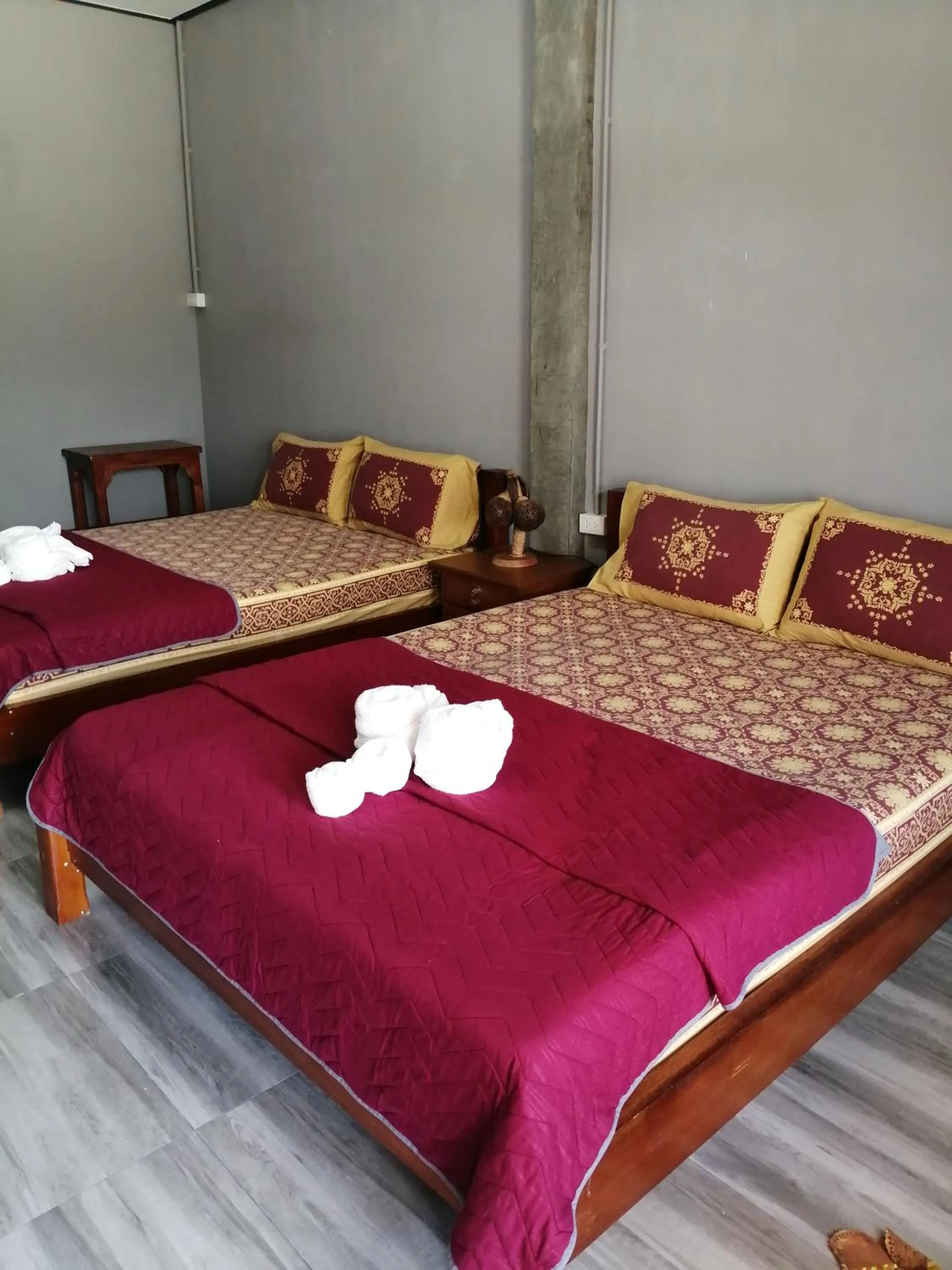Bed in Yotin Guest House