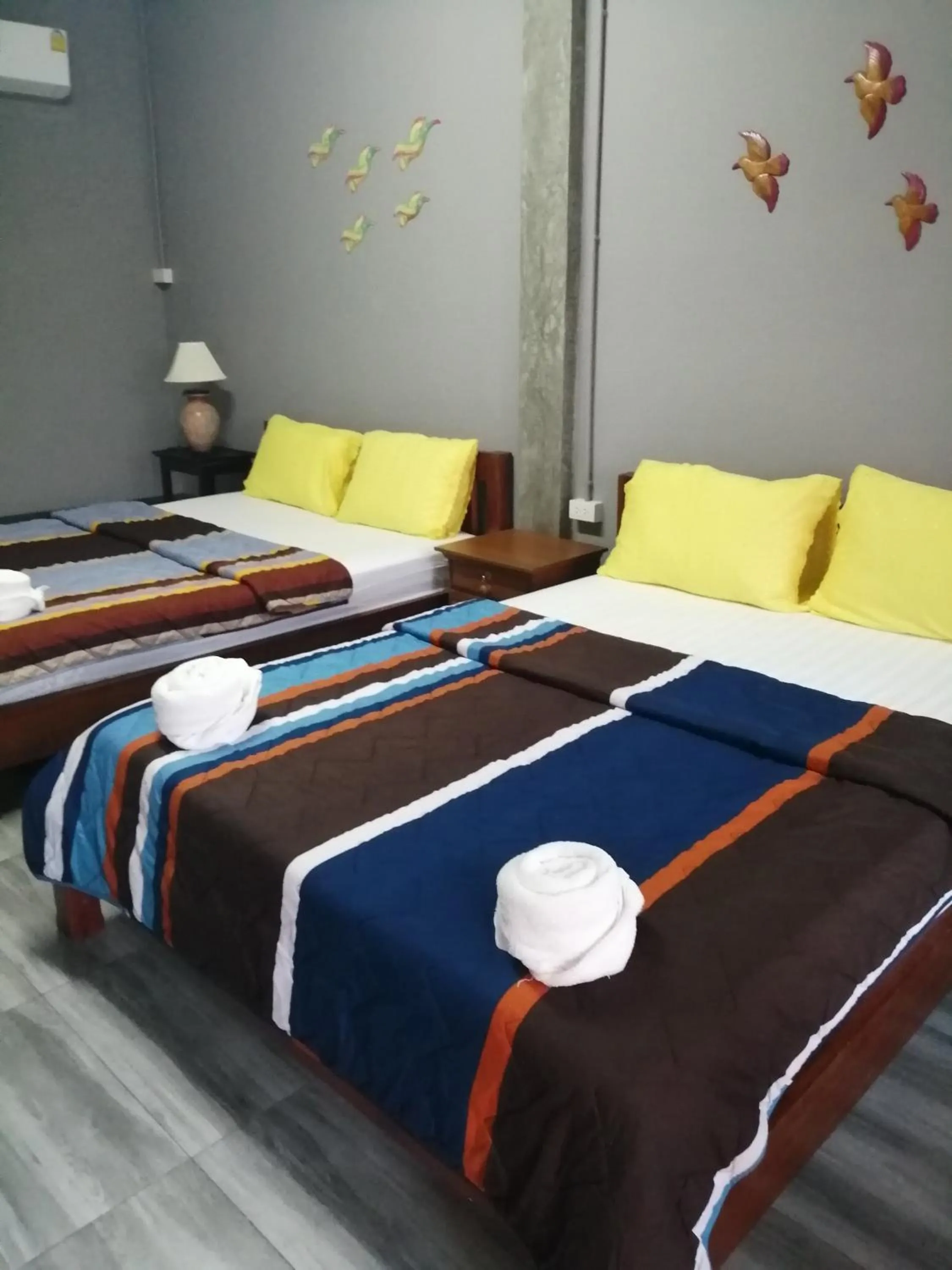 Bed in Yotin Guest House