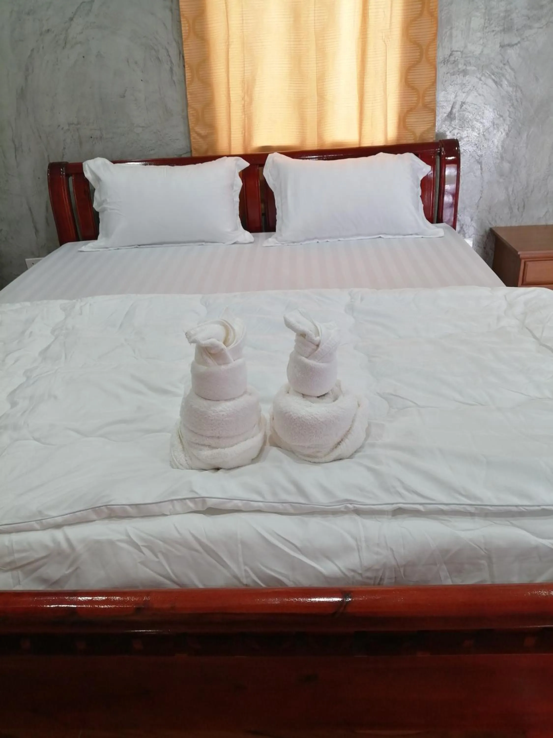 Bed in Yotin Guest House