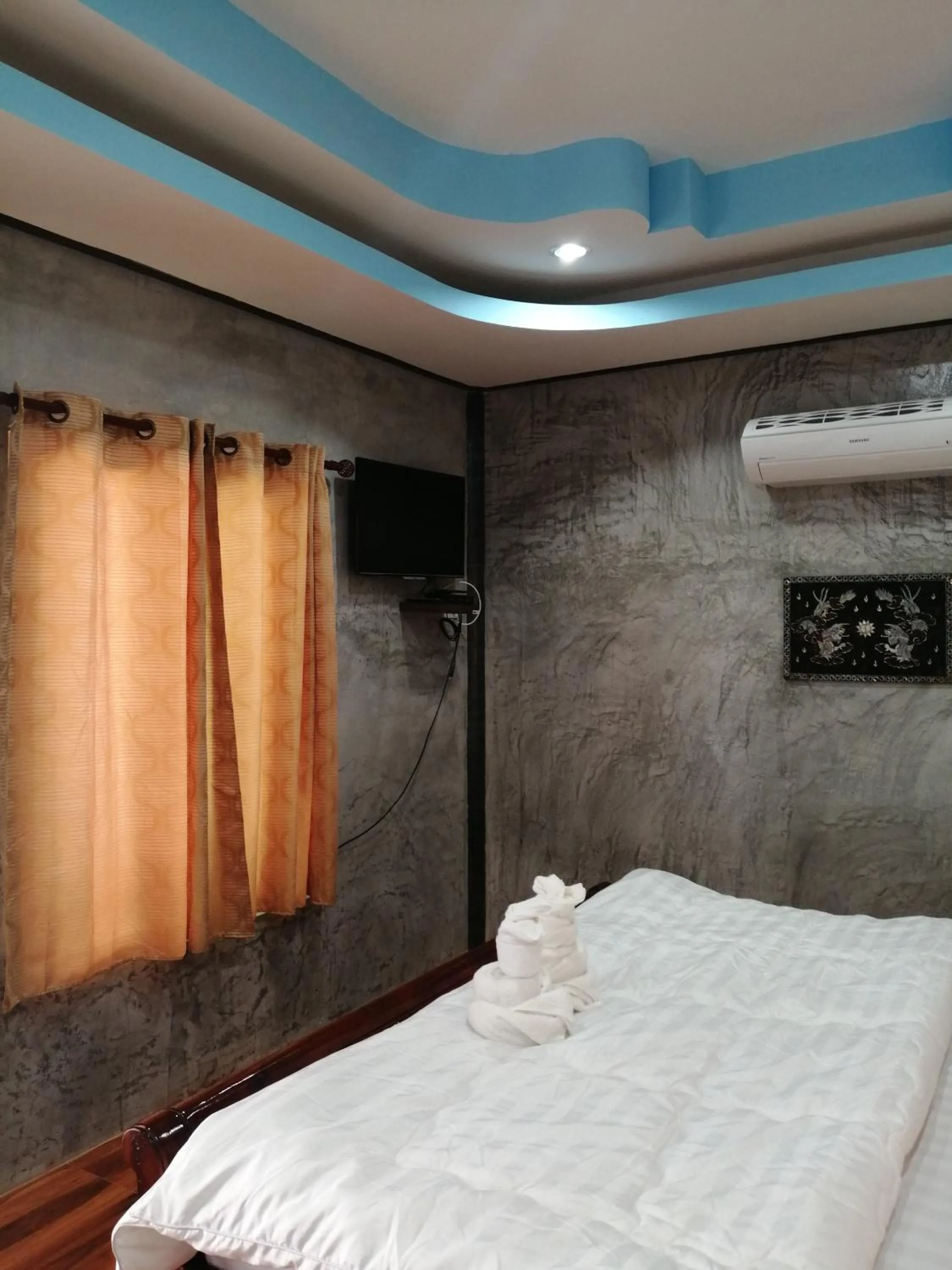 Bed in Yotin Guest House