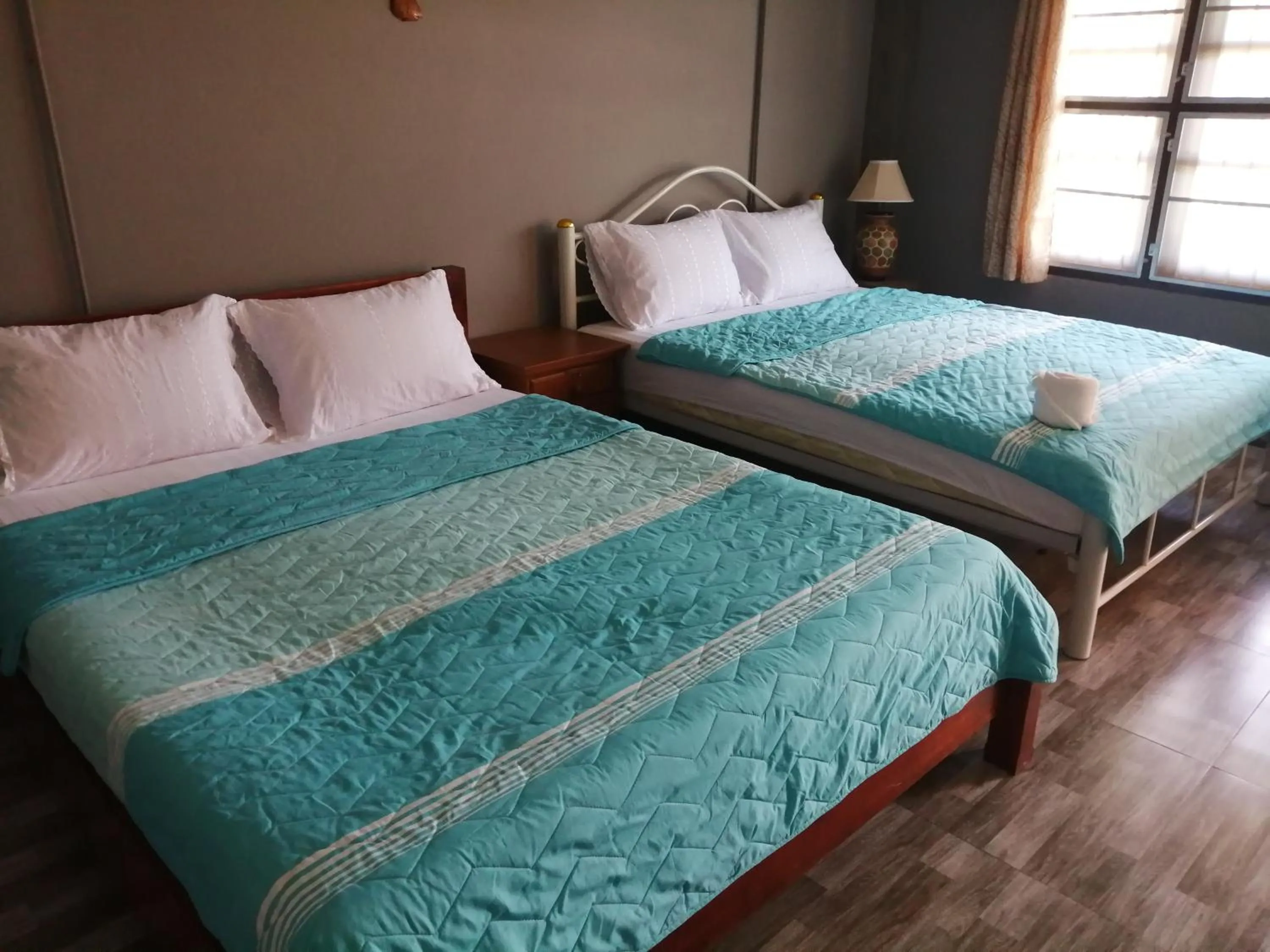 Bed in Yotin Guest House