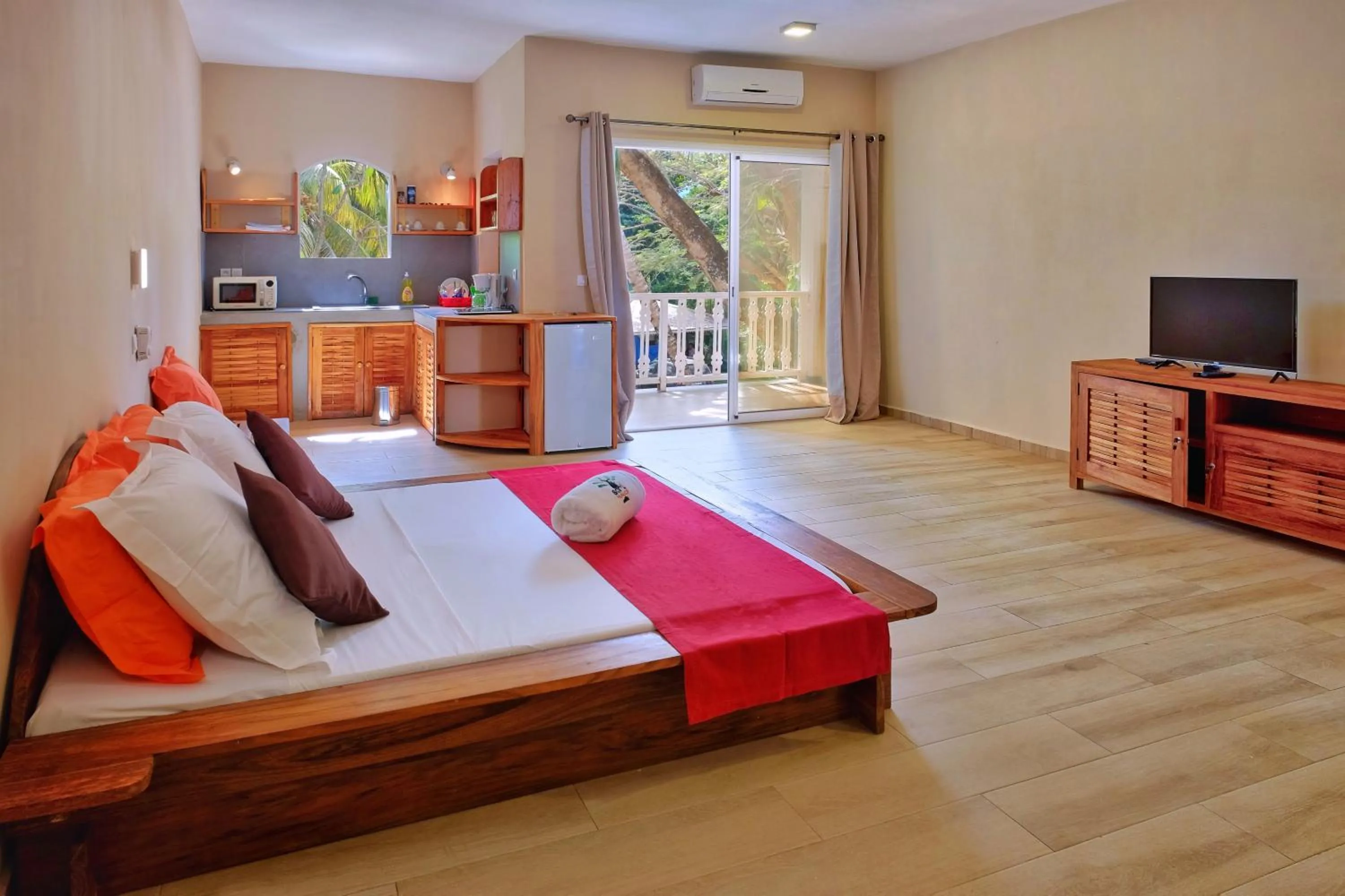 Bed in Hôtel Sarimanok