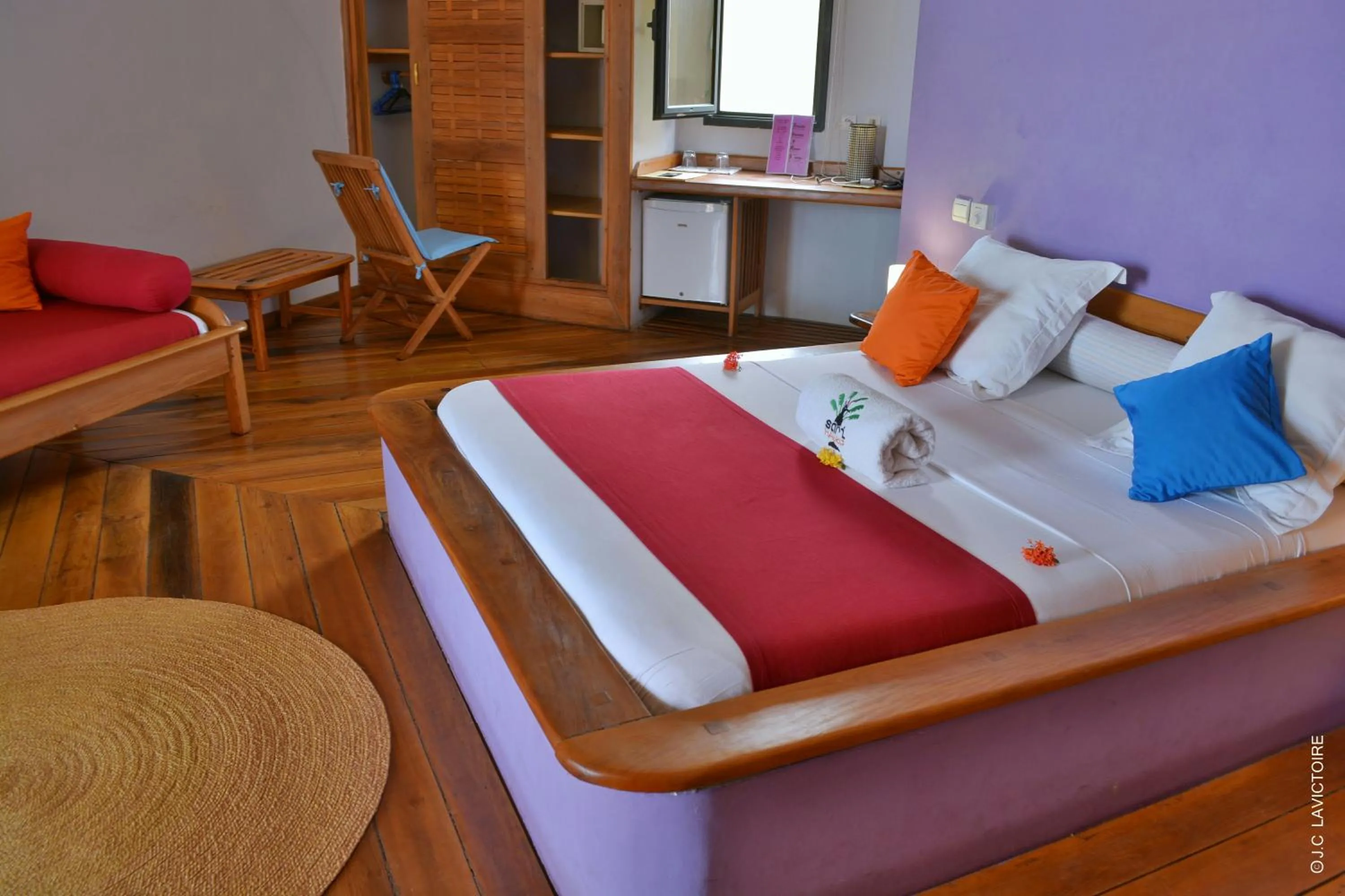 Bed in Hôtel Sarimanok