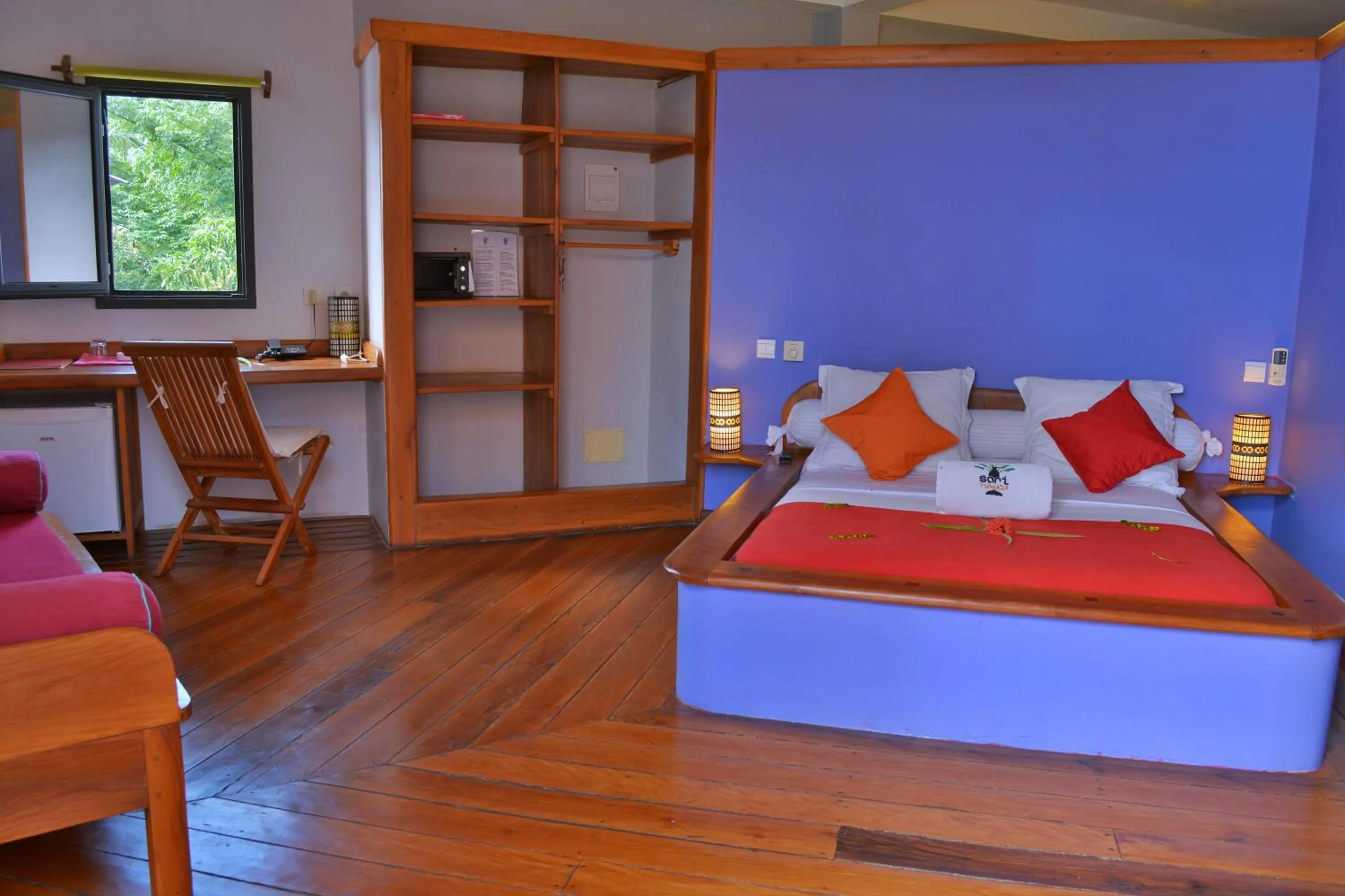 Bed in Hôtel Sarimanok