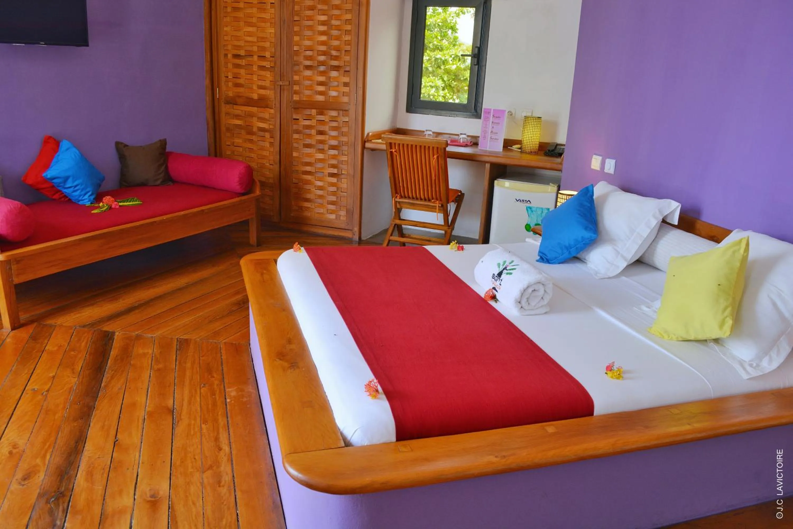 Bed in Hôtel Sarimanok