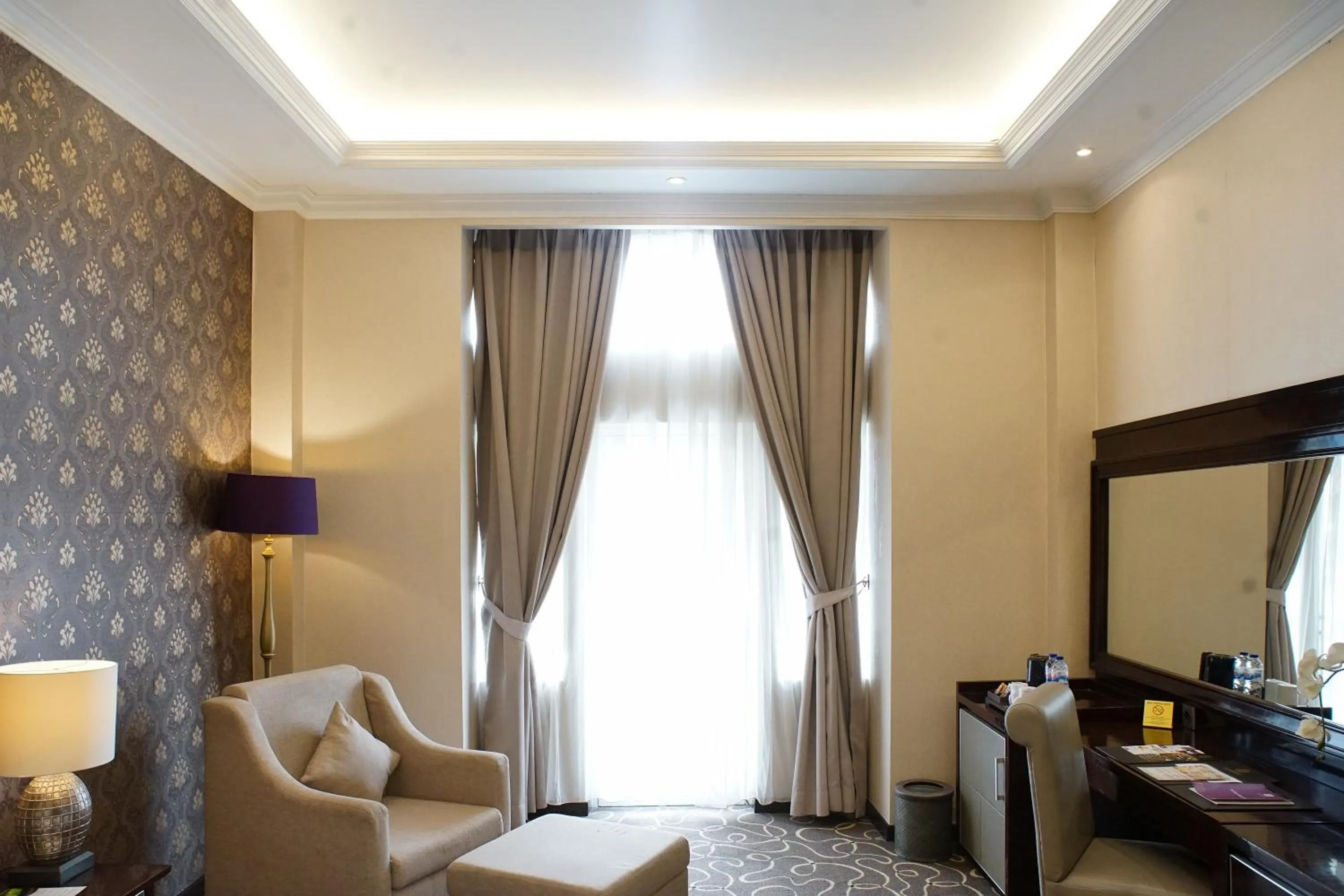 Seating area in Adhiwangsa Hotel