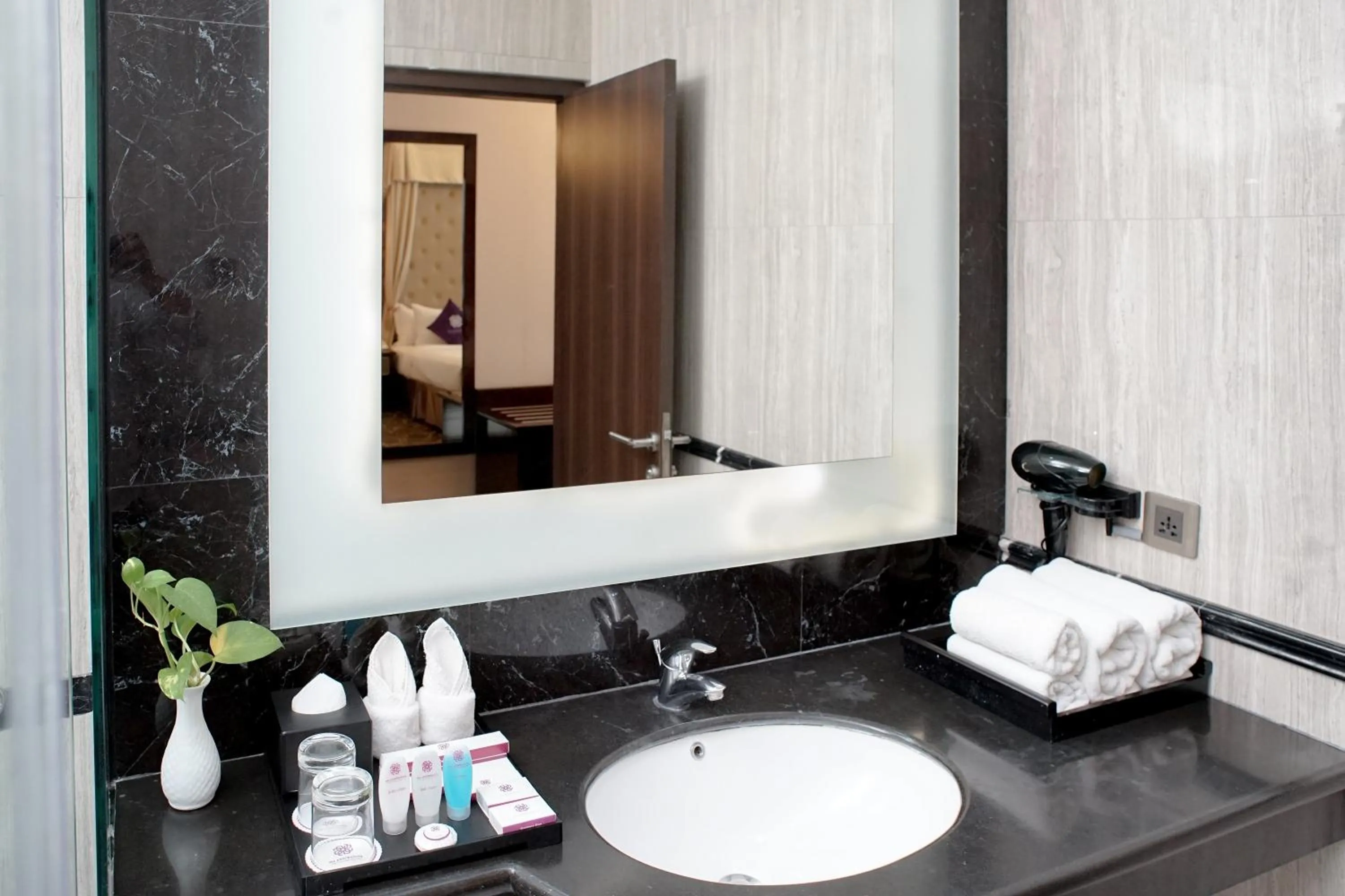 Bathroom in Adhiwangsa Hotel