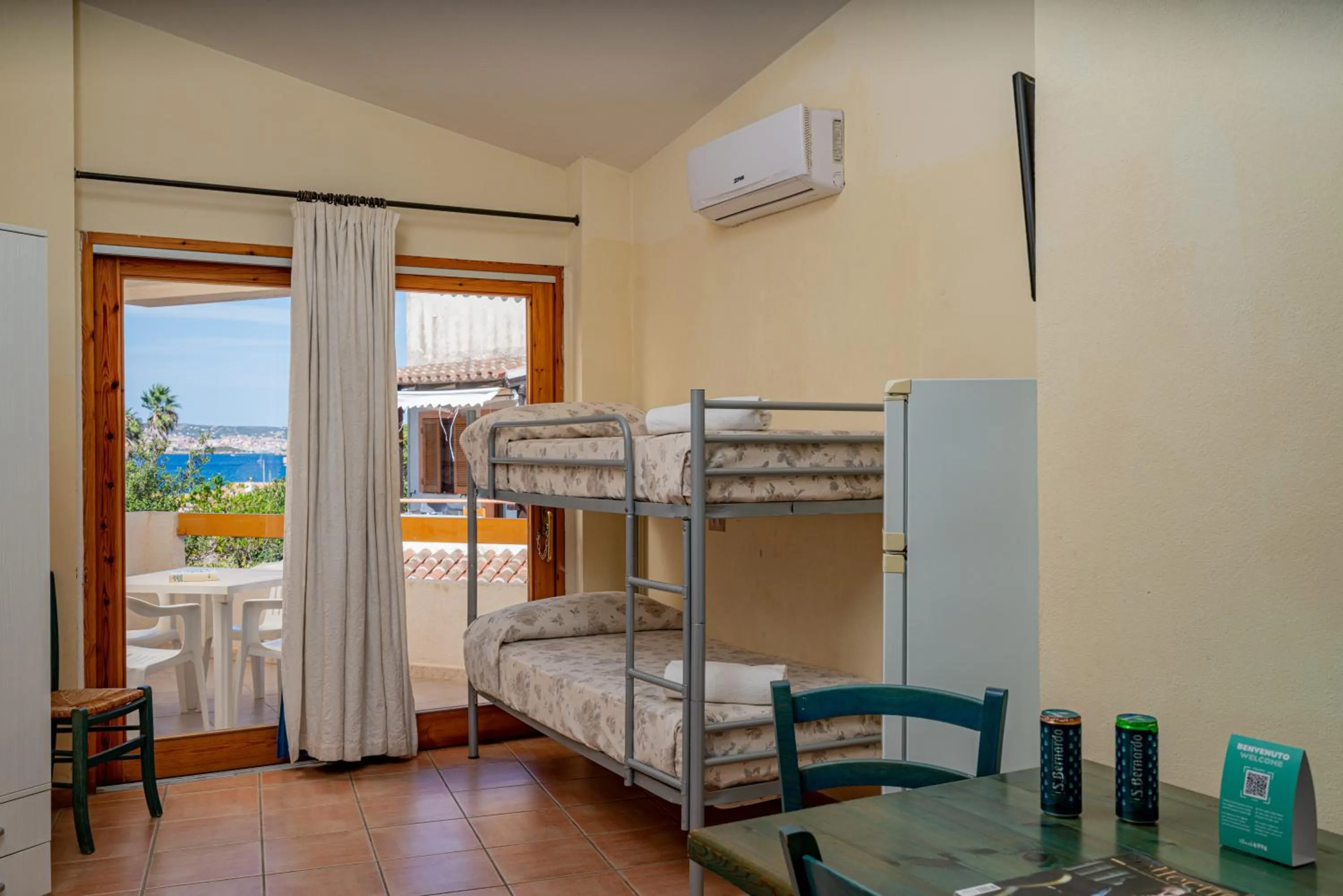 Bed in Club Esse Residence Capo D'orso