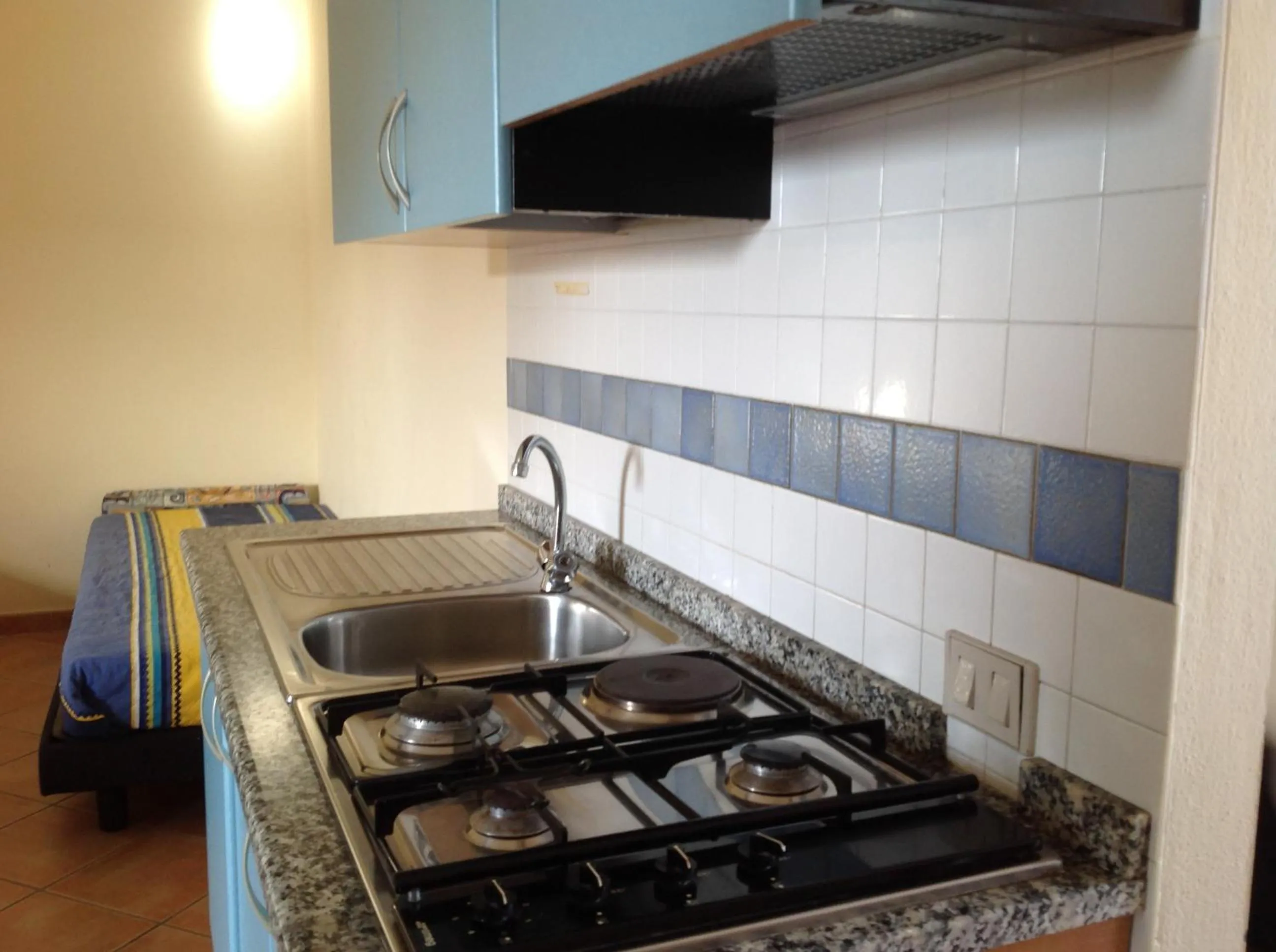 Kitchen or kitchenette in Club Esse Residence Capo D'orso