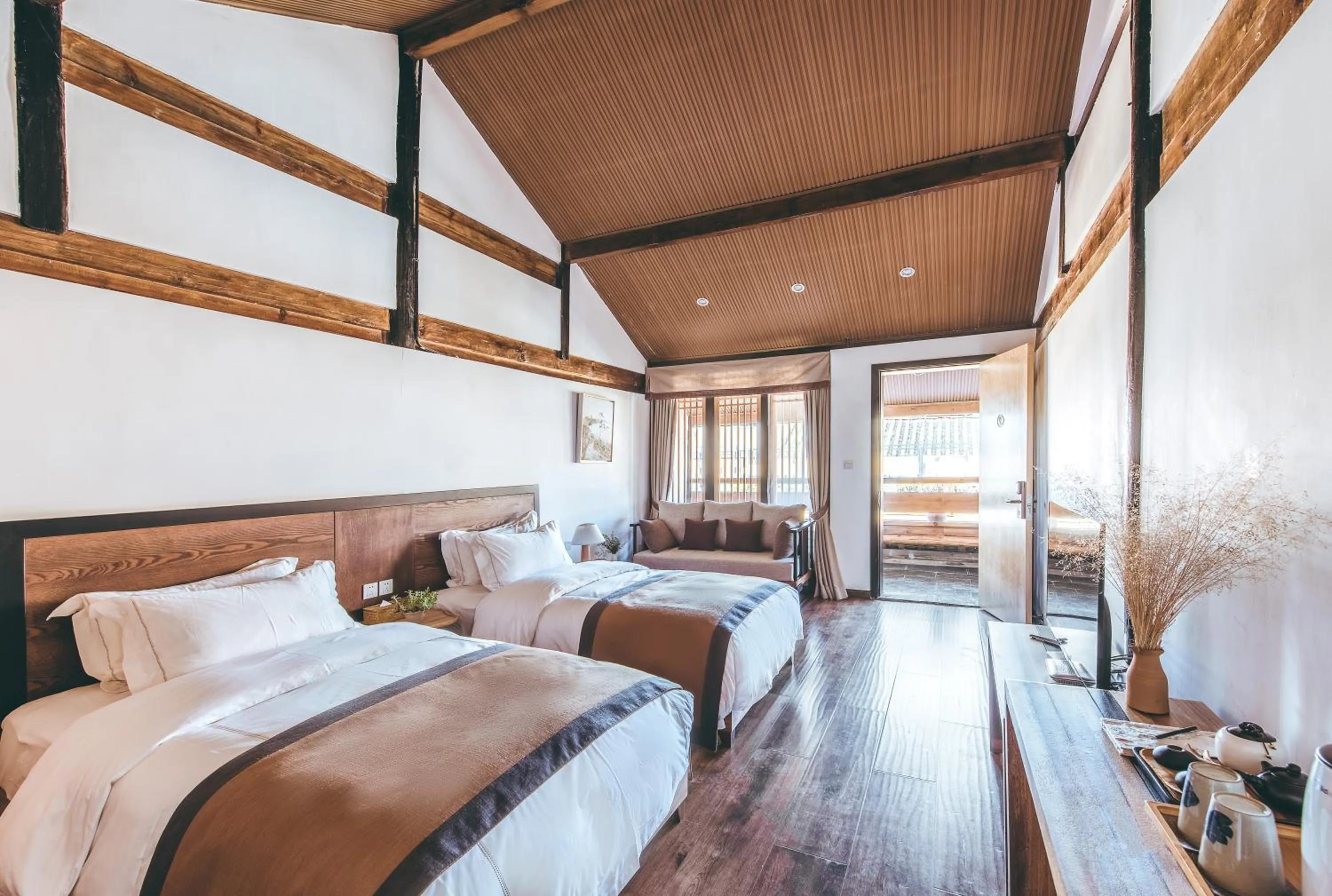 Bed in Dali Shaxi Qing Jing Courtyard