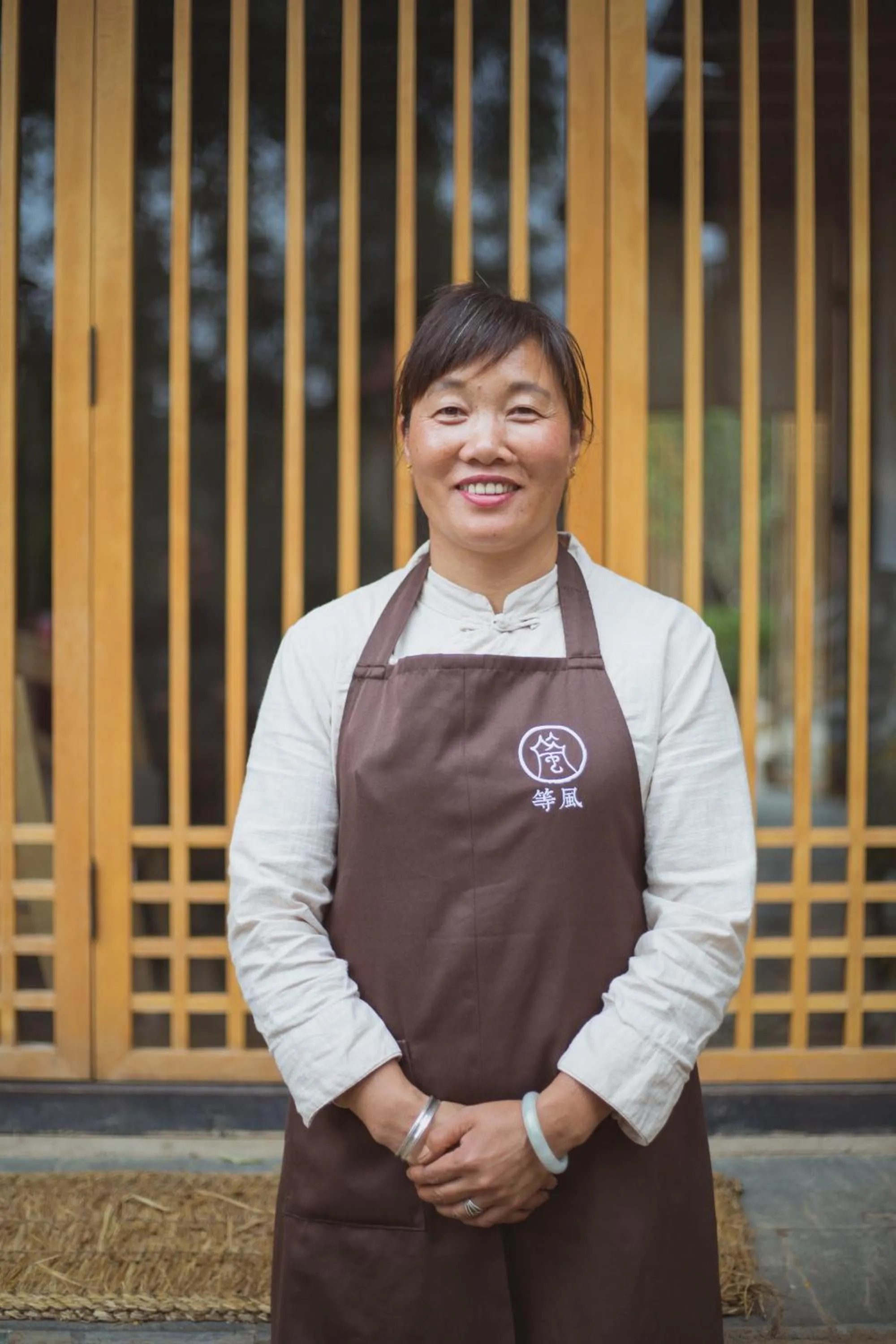 Staff in Dali Shaxi Qing Jing Courtyard